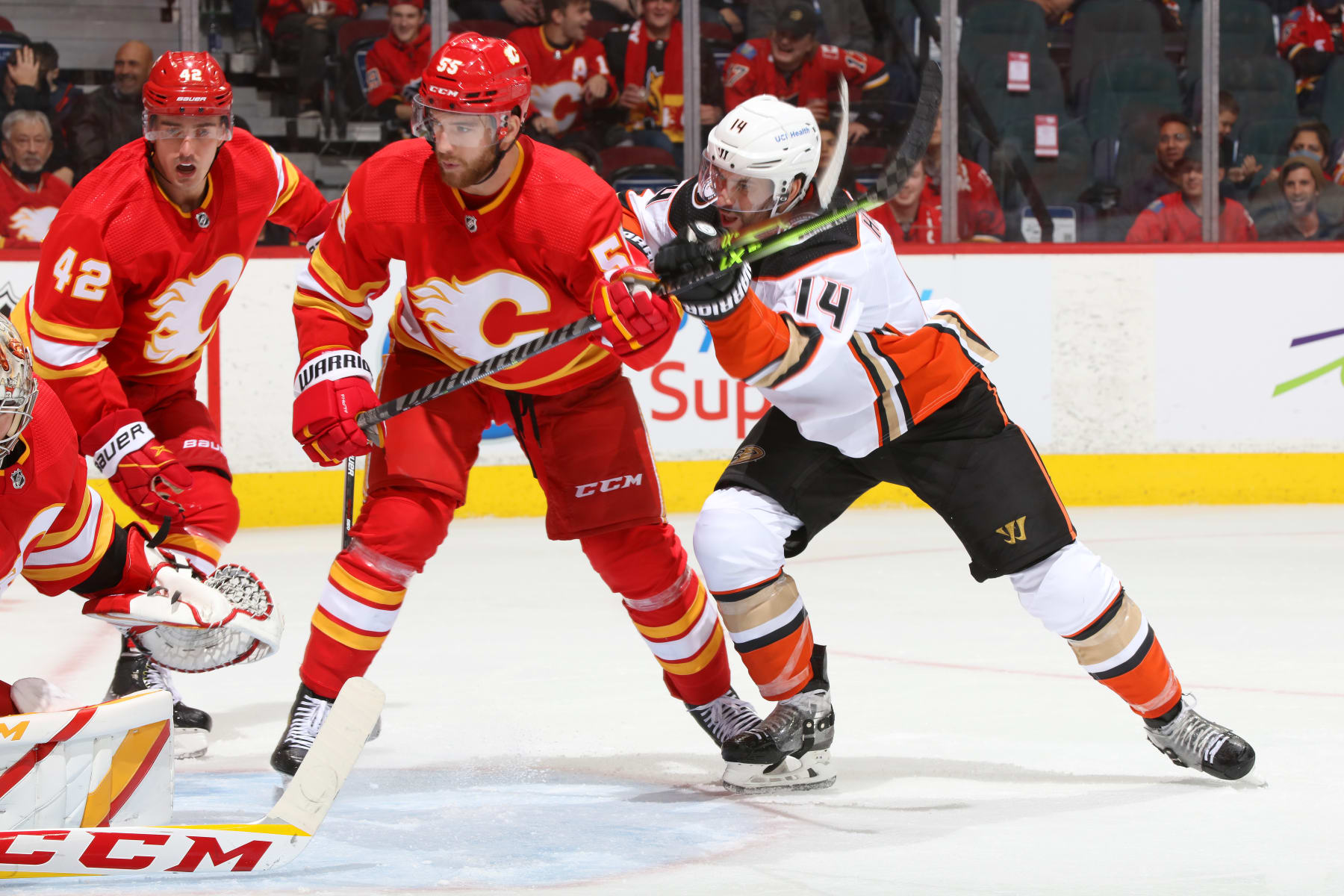 Calgary Flames defenseman Noah Hanifin (left) and Anaheim Ducks center Adam Henrique. 