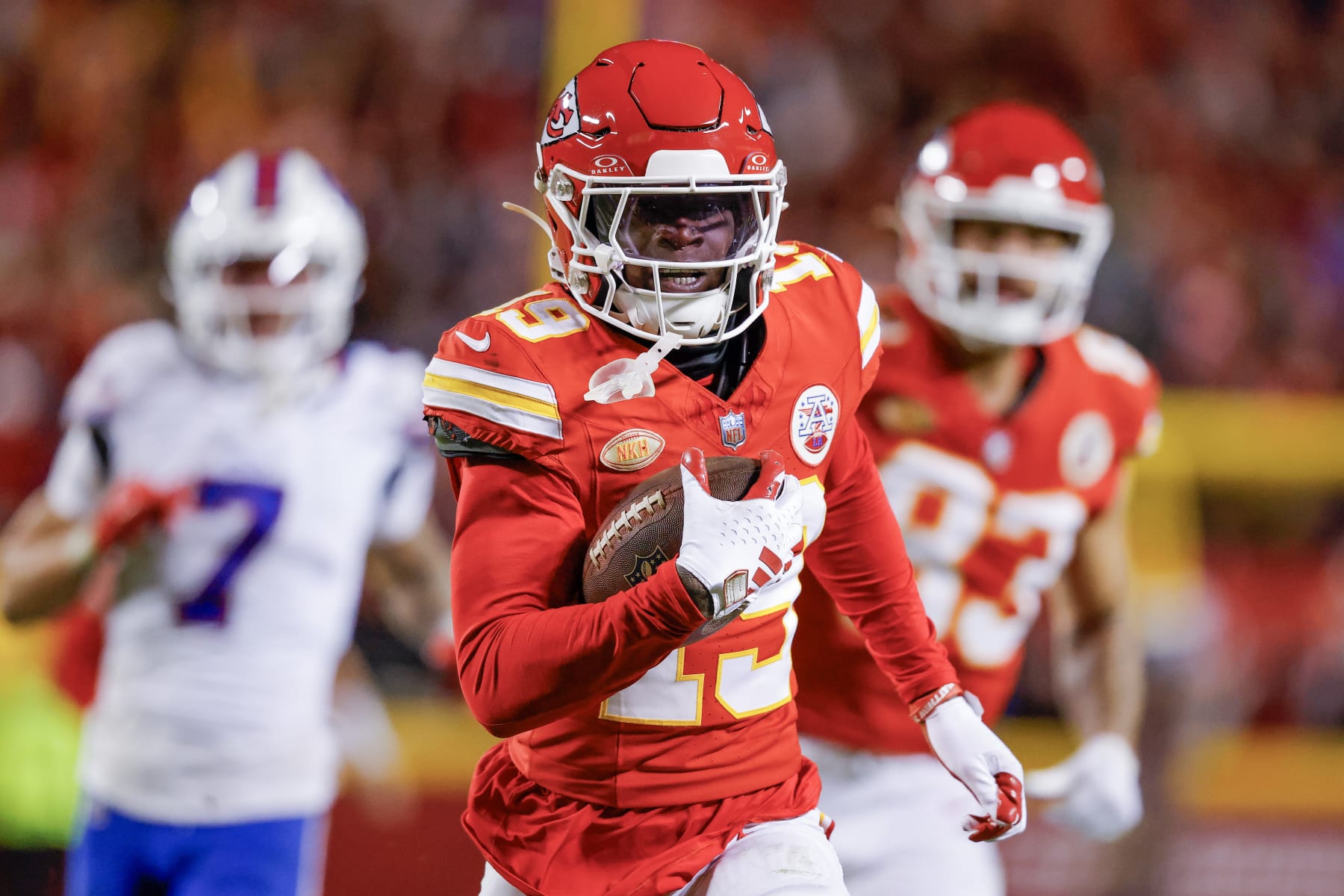 KANSAS CITY, MISSOURI - DECEMBER 10: Kadarius Toney #19 of the Kansas City Chiefs carries the ball for a touchdown on a play that was called back due to a penalty during the second half of the game against the Buffalo Bills at GEHA Field at Arrowhead Stadium on December 10, 2023 in Kansas City, Missouri. (Photo by David Eulitt/Getty Images)