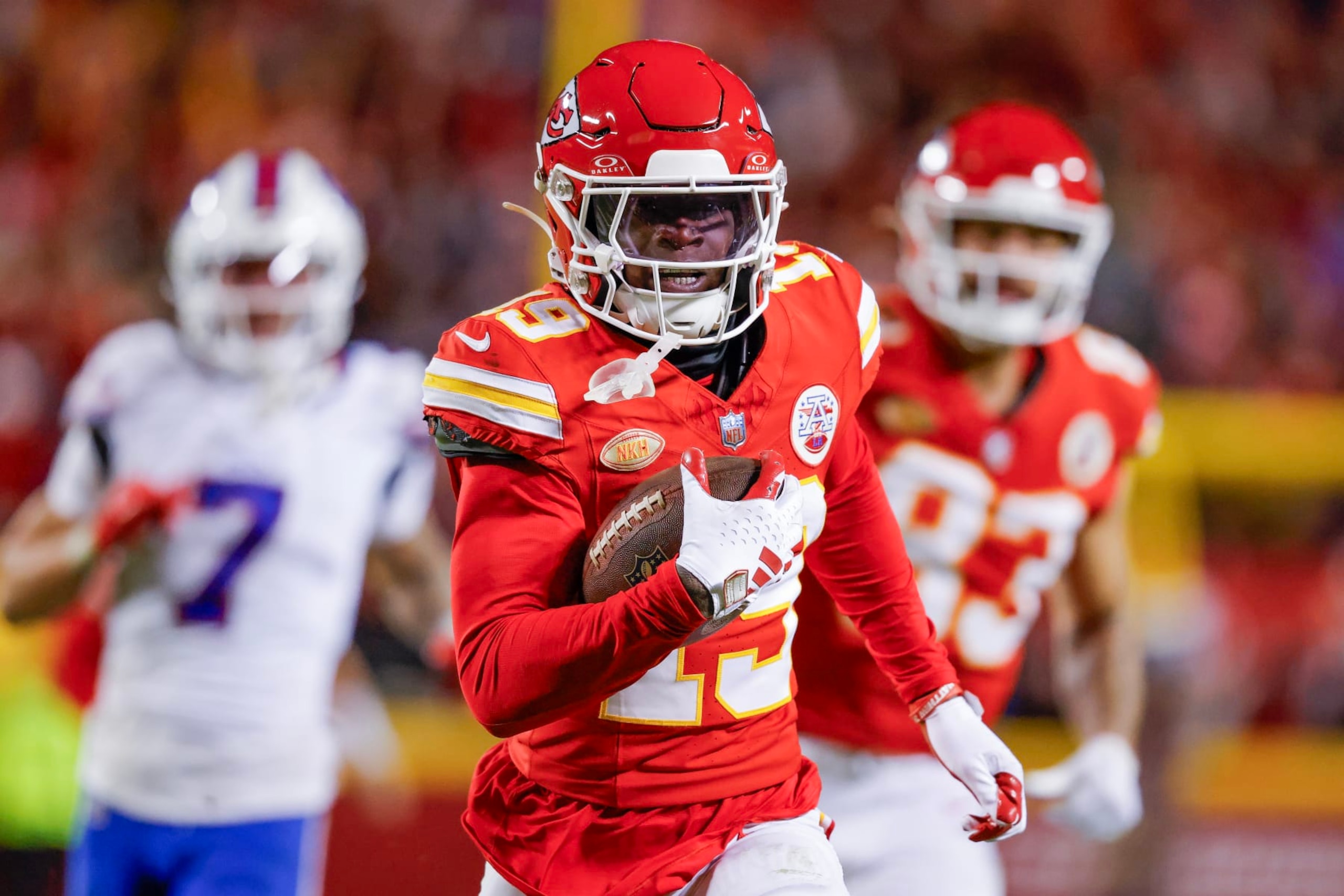 KANSAS CITY, MISSOURI - DECEMBER 10: Kadarius Toney #19 of the Kansas City Chiefs carries the ball for a touchdown on a play that was called back due to a penalty during the second half of the game against the Buffalo Bills at GEHA Field at Arrowhead Stadium on December 10, 2023 in Kansas City, Missouri. (Photo by David Eulitt/Getty Images)