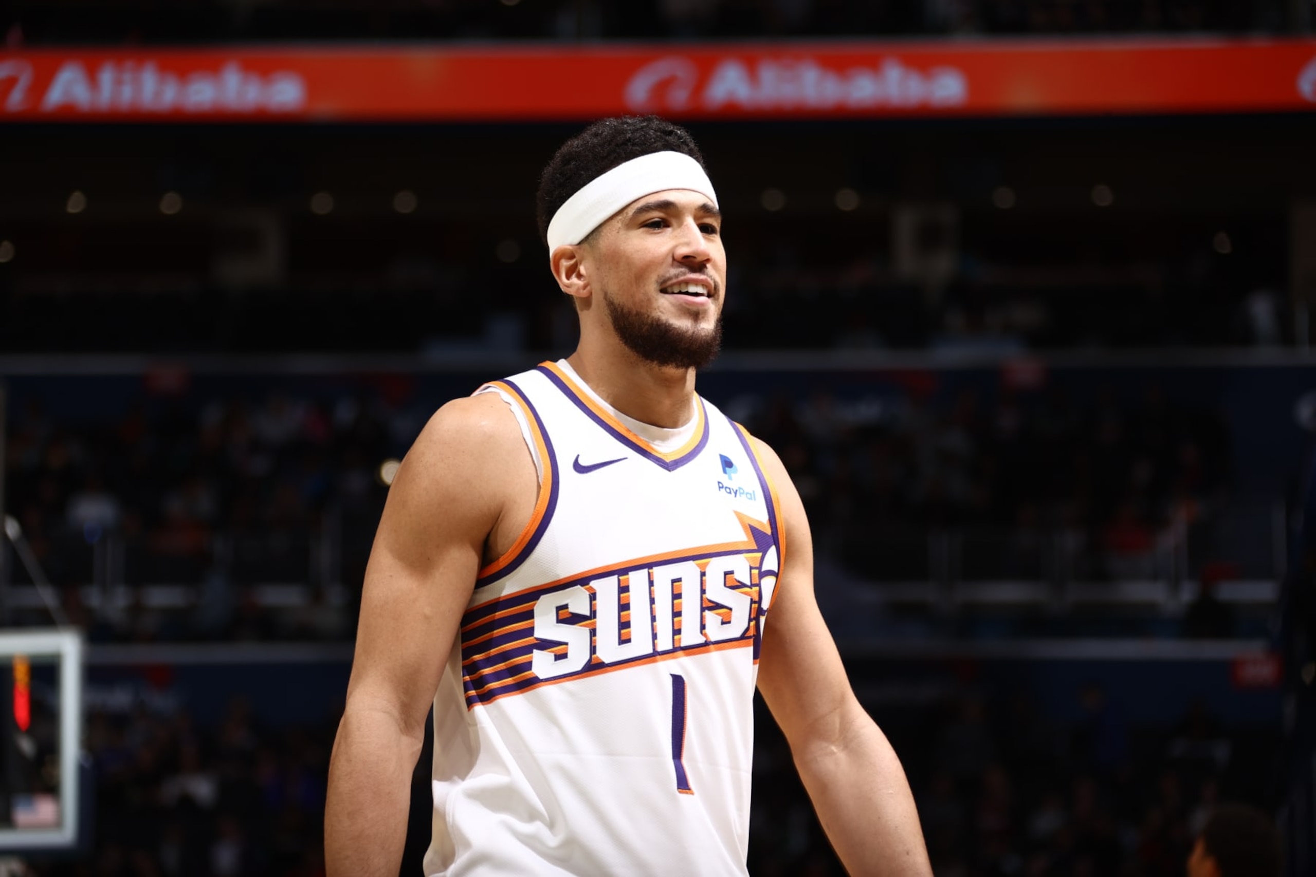 WASHINGTON, DC -  FEBRUARY 4: Devin Booker #1 of the Phoenix Suns smiles during the game against the Washington Wizards on February 4, 2024 at Capital One Arena in Washington, DC. NOTE TO USER: User expressly acknowledges and agrees that, by downloading and or using this Photograph, user is consenting to the terms and conditions of the Getty Images License Agreement. Mandatory Copyright Notice: Copyright 2024 NBAE (Photo by Kenny Giarla/NBAE via Getty Images)