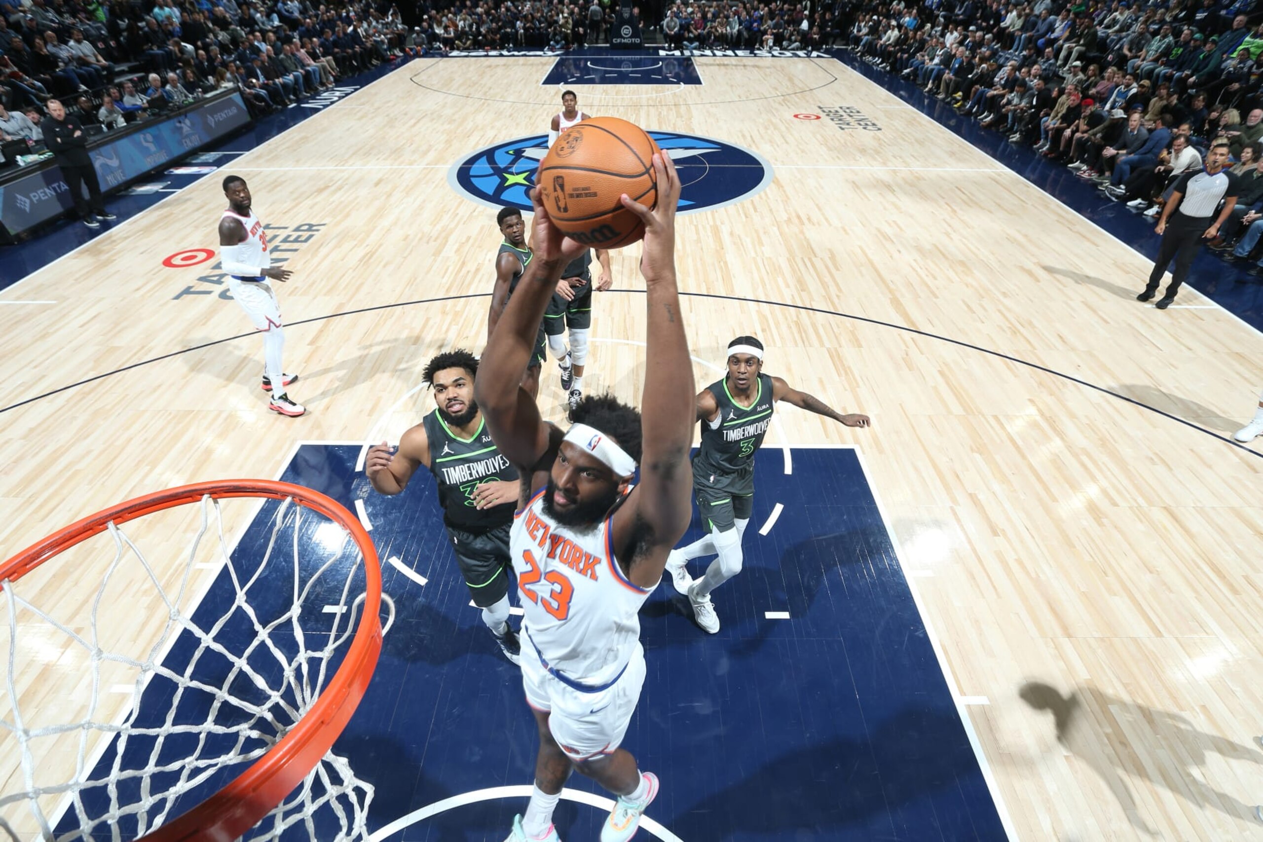 MINNEAPOLIS, MN - NOVEMBER 20: Mitchell Robinson #23 of the New York Knicks dunks the ball during the game against the Minnesota Timberwolves on November 20, 2023 at Target Center in Minneapolis, Minnesota. NOTE TO USER: User expressly acknowledges and agrees that, by downloading and or using this Photograph, user is consenting to the terms and conditions of the Getty Images License Agreement. Mandatory Copyright Notice: Copyright 2023 NBAE (Photo by David Sherman/NBAE via Getty Images) MINNEAPOLIS, MN - NOVEMBER 20: Mitchell Robinson #23 of the New York Knicks dunks the ball during the game against the Minnesota Timberwolves on November 20, 2023 at Target Center in Minneapolis, Minnesota. NOTE TO USER: User expressly acknowledges and agrees that, by downloading and or using this Photograph, user is consenting to the terms and conditions of the Getty Images License Agreement. Mandatory Copyright Notice: Copyright 2023 NBAE (Photo by David Sherman/NBAE via Getty Images)