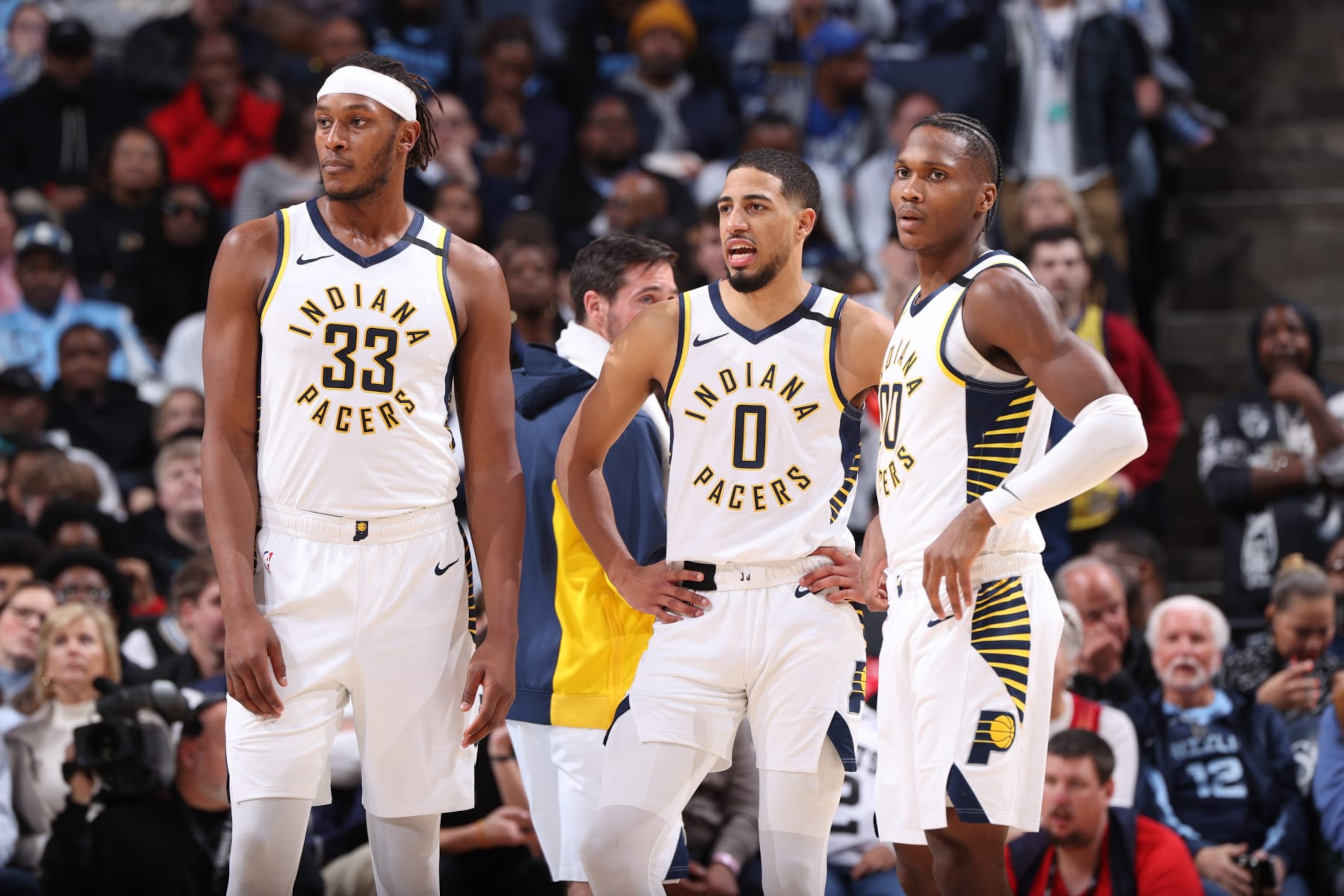 MEMPHIS, TN - DECEMBER 21: Myles Turner #33 of the Indiana Pacers, Tyrese Haliburton #0 of the Indiana Pacers and Bennedict Mathurin #00 of the Indiana Pacers look on during the game against the Memphis Grizzlies on December 21, 2023 at FedExForum in Memphis, Tennessee. NOTE TO USER: User expressly acknowledges and agrees that, by downloading and or using this photograph, User is consenting to the terms and conditions of the Getty Images License Agreement. Mandatory Copyright Notice: Copyright 2023 NBAE (Photo by Joe Murphy/NBAE via Getty Images) MEMPHIS, TN - DECEMBER 21: Myles Turner #33 of the Indiana Pacers, Tyrese Haliburton #0 of the Indiana Pacers and Bennedict Mathurin #00 of the Indiana Pacers look on during the game against the Memphis Grizzlies on December 21, 2023 at FedExForum in Memphis, Tennessee. NOTE TO USER: User expressly acknowledges and agrees that, by downloading and or using this photograph, User is consenting to the terms and conditions of the Getty Images License Agreement. Mandatory Copyright Notice: Copyright 2023 NBAE (Photo by Joe Murphy/NBAE via Getty Images)