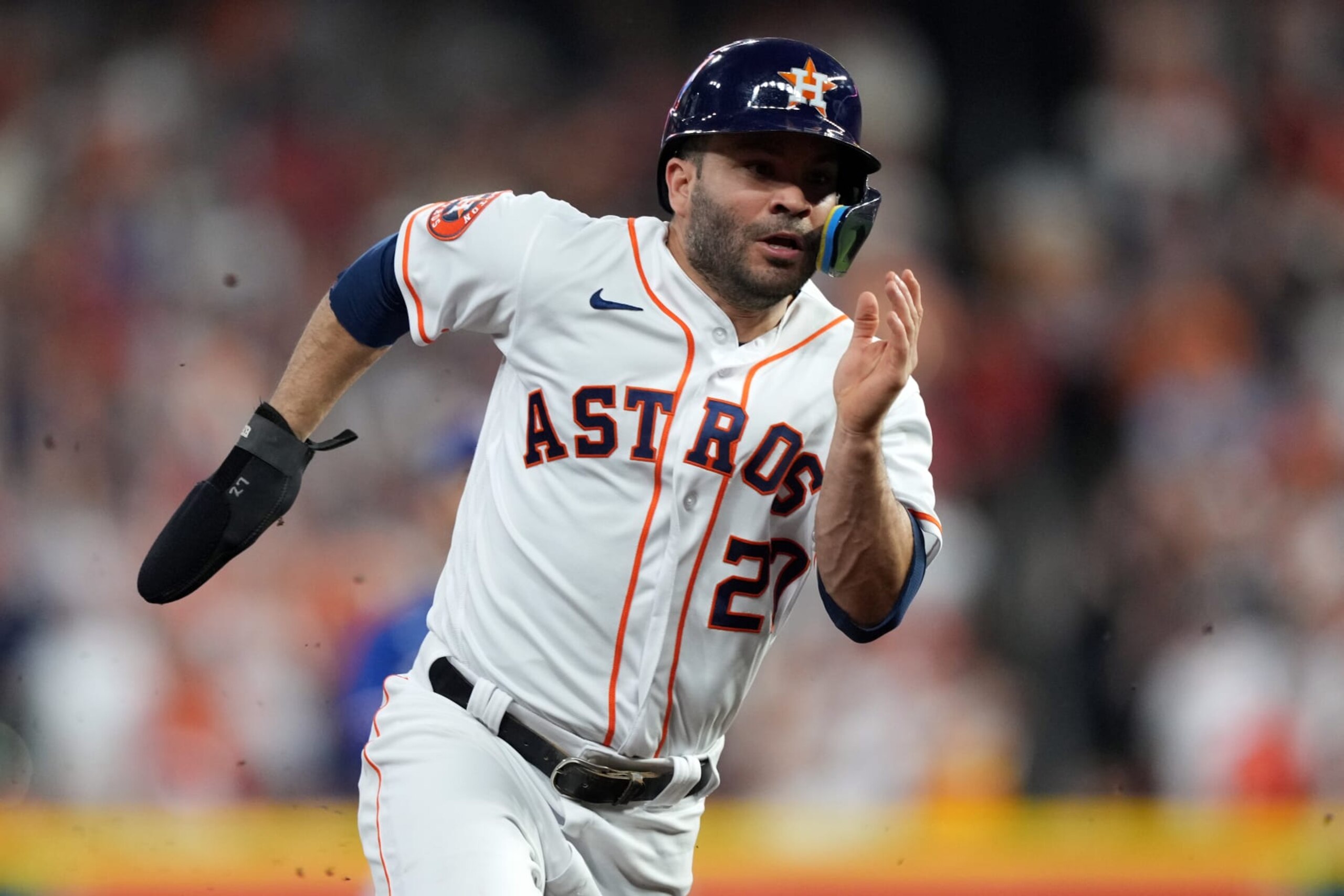 HOUSTON, TX - OCTOBER 23: Jose Altuve #27 of the Houston Astros scores on a single by Jose Abreu #79 in the first inning during Game 7 of the ALCS between the Texas Rangers and the Houston Astros at Minute Maid Park on Monday, October 23, 2023 in Houston, Texas. (Photo by Alex Bierens de Haan/MLB Photos via Getty Images)