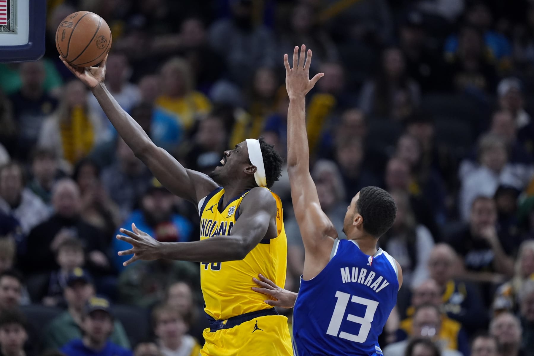 INDIANAPOLIS, INDIANA - FEBRUARY 02: Pascal Siakam #43 of the Indiana Pacers attempts a layup while being guarded by Keegan Murray #13 of the Sacramento Kings in the first quarter at Gainbridge Fieldhouse on February 02, 2024 in Indianapolis, Indiana. NOTE TO USER: User expressly acknowledges and agrees that, by downloading and or using this photograph, User is consenting to the terms and conditions of the Getty Images License Agreement. (Photo by Dylan Buell/Getty Images)