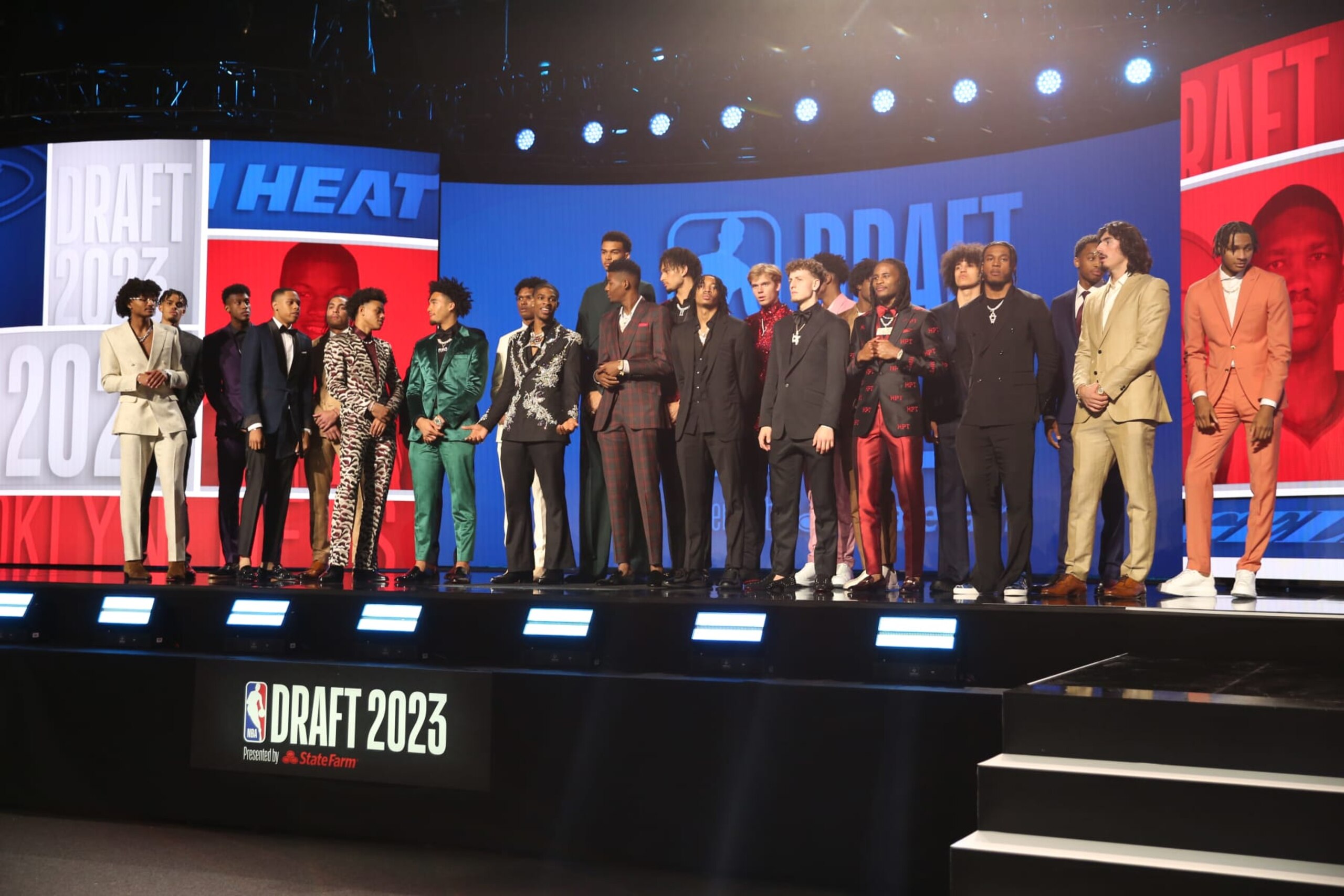 BROOKLYN, NY - JUNE 22: Rayan Rupert, Kobe Brown, Olivier-Maxence Prosper, Jordan Hawkins, Jett Howard, Keyonte George, Ausar Thompson, Jalen Hood-Schifino, Amen Thompson, Scoot Henderson, Victor Wembanyama, Brandon Miller, Dereck Lively II, Nick Smith Jr., Gradey Dick, Taylor Hendricks, Brandin Podziemski, Jarace Walker, Cason Wallace, Anthony Black, Cam Whitmore, Bilal Coulibaly, Jaime Jaquez Jr., Noah Clowney pose for a group shot for the draft class during the 2023 NBA Draft on June 22, 2023 at Barclays Center in Brooklyn, New York. NOTE TO USER: User expressly acknowledges and agrees that, by downloading and or using this photograph, User is consenting to the terms and conditions of the Getty Images License Agreement. Mandatory Copyright Notice: Copyright 2023 NBAE (Photo by Kai Tseha/NBAE via Getty Images)