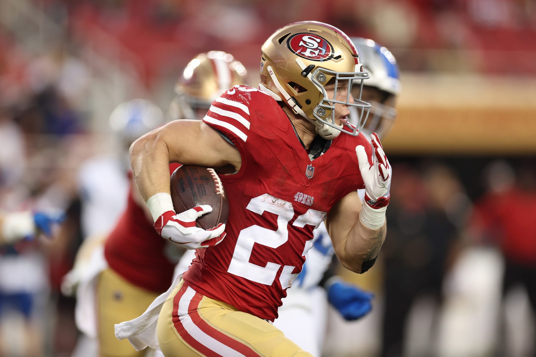 SANTA CLARA, CALIFORNIA - JANUARY 28: Christian McCaffrey #23 of the San Francisco 49ers runs the ball during the third quarter against the Detroit Lions in the NFC Championship Game at Levi's Stadium on January 28, 2024 in Santa Clara, California. (Photo by Ezra Shaw/Getty Images)