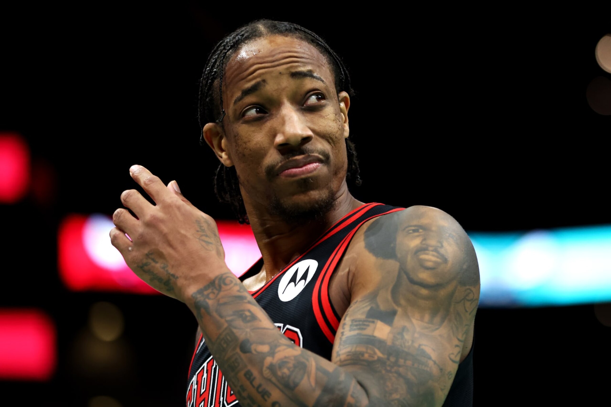 CHARLOTTE, NORTH CAROLINA - JANUARY 31: DeMar DeRozan #11 of the Chicago Bulls reacts during the second half of an NBA game against the Charlotte Hornets at Spectrum Center on January 31, 2024 in Charlotte, North Carolina. NOTE TO USER: User expressly acknowledges and agrees that, by downloading and or using this photograph, User is consenting to the terms and conditions of the Getty Images License Agreement. (Photo by David Jensen/Getty Images)