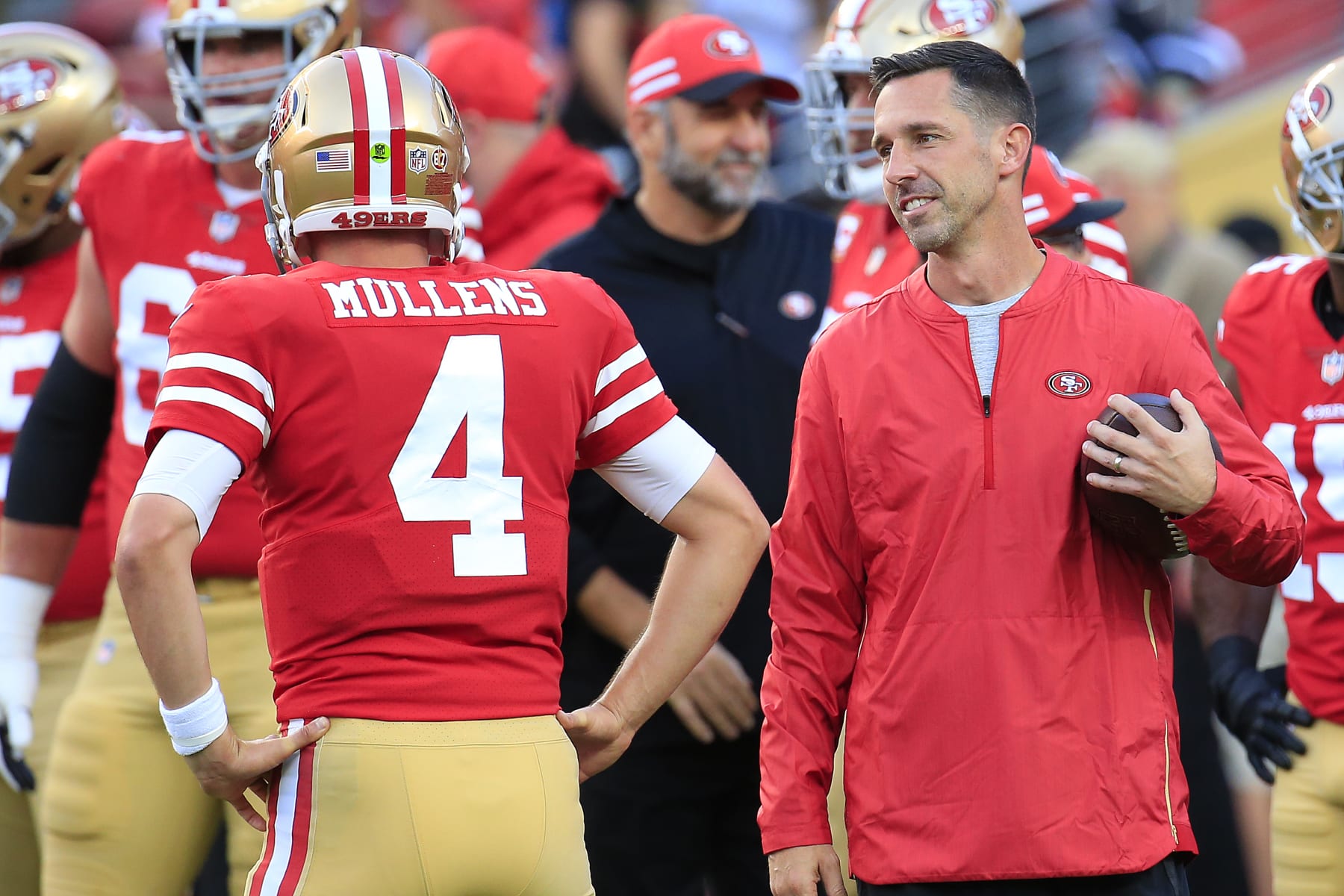 SANTA CLARA, CA - NOVEMBER 01: Head coach Kyle Shanahan speaks with Nick Mullens #4 of the San Francisco 49ers prior to their game against the Oakland Raiders at Levi's Stadium on November 1, 2018 in Santa Clara, California. (Photo by Daniel Shirey/Getty Images)
