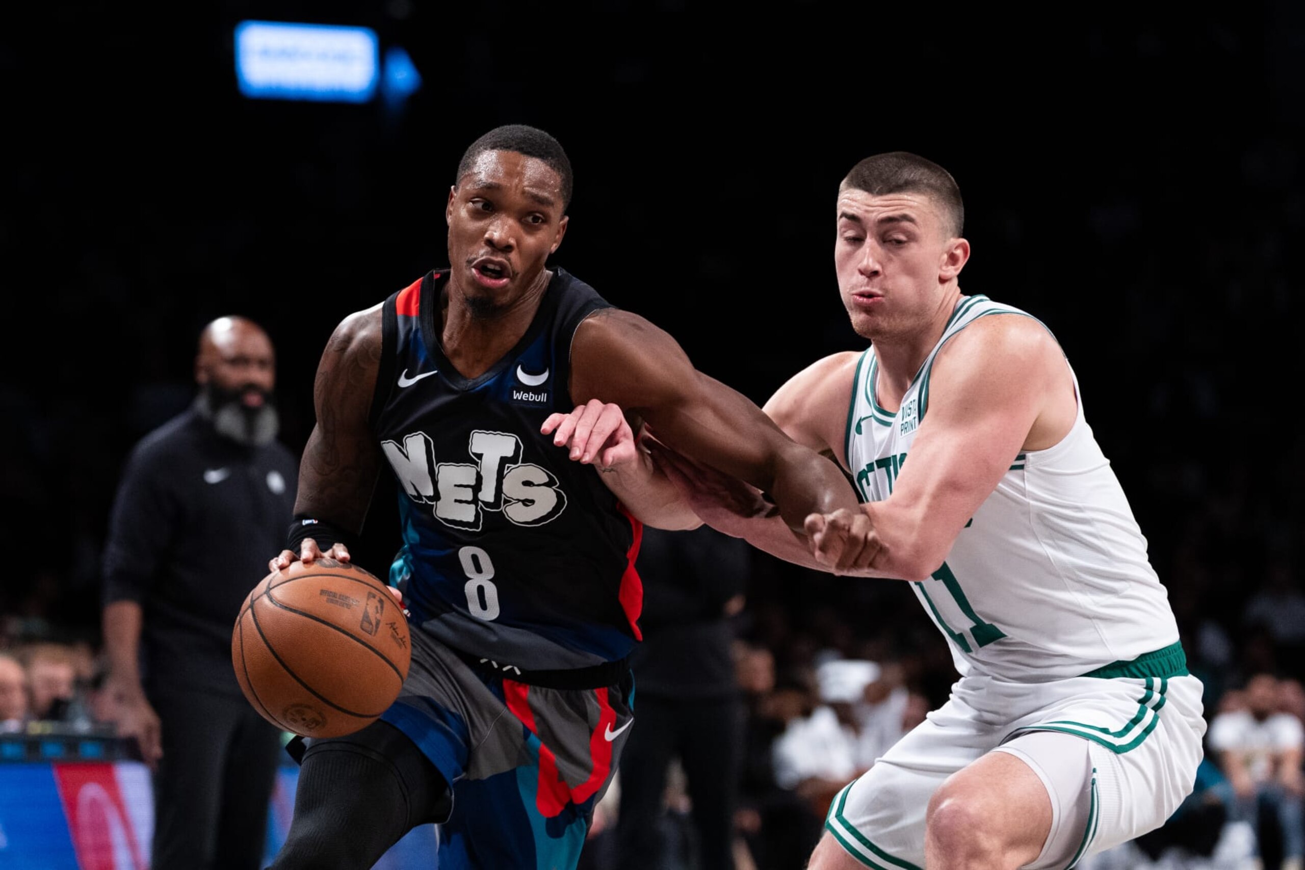 NEW YORK, NEW YORK - NOVEMBER 04: Lonnie Walker IV #8 of the Brooklyn Nets is guarded by Payton Pritchard #11 of the Boston Celtics during the first quarter of the game at Barclays Center on November 04, 2023 in New York City. NOTE TO USER: User expressly acknowledges and agrees that, by downloading and or using this photograph, User is consenting to the terms and conditions of the Getty Images License Agreement. (Photo by Dustin Satloff/Getty Images)