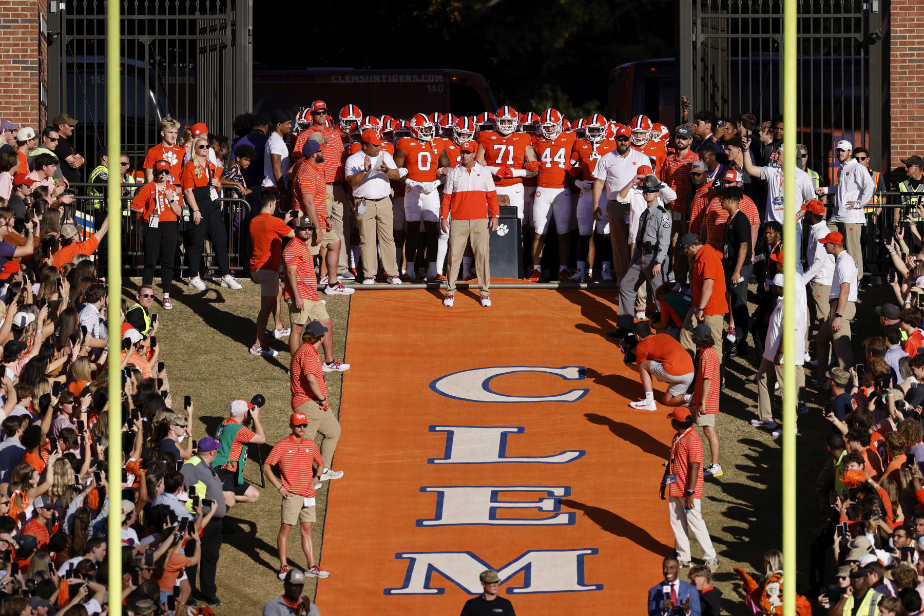 CLEMSON, SC - NOVEMBER 18: Clemson Tigers head coach Dabo Swinney gets ready to lead his team to the field before a college football game against the North Carolina Tar Heels on November 18, 2023 at Memorial Stadium in Clemson, South Carolina. (Photo by Joe Robbins/Icon Sportswire via Getty Images)
