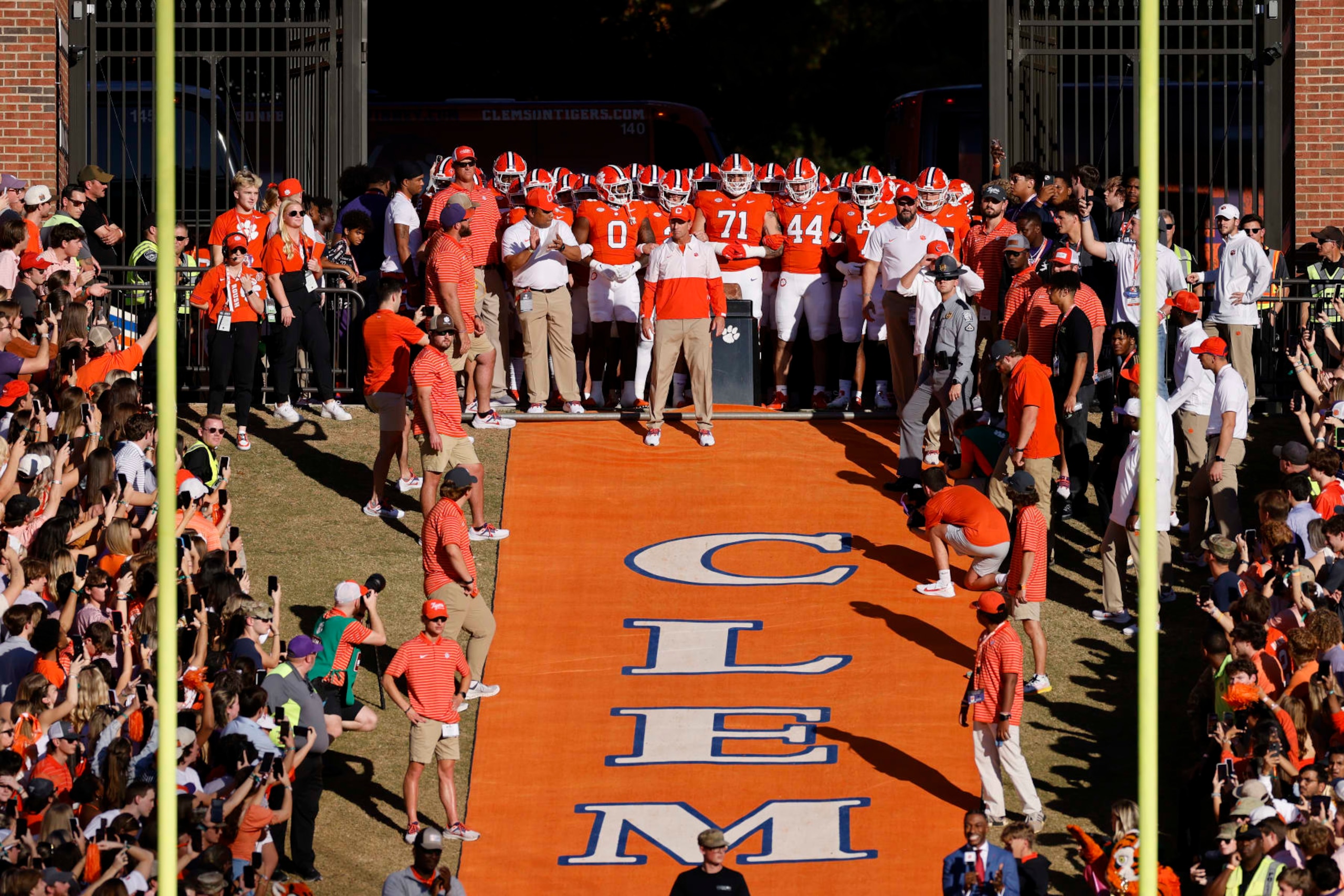 CLEMSON, SC - NOVEMBER 18: Clemson Tigers head coach Dabo Swinney gets ready to lead his team to the field before a college football game against the North Carolina Tar Heels on November 18, 2023 at Memorial Stadium in Clemson, South Carolina. (Photo by Joe Robbins/Icon Sportswire via Getty Images)