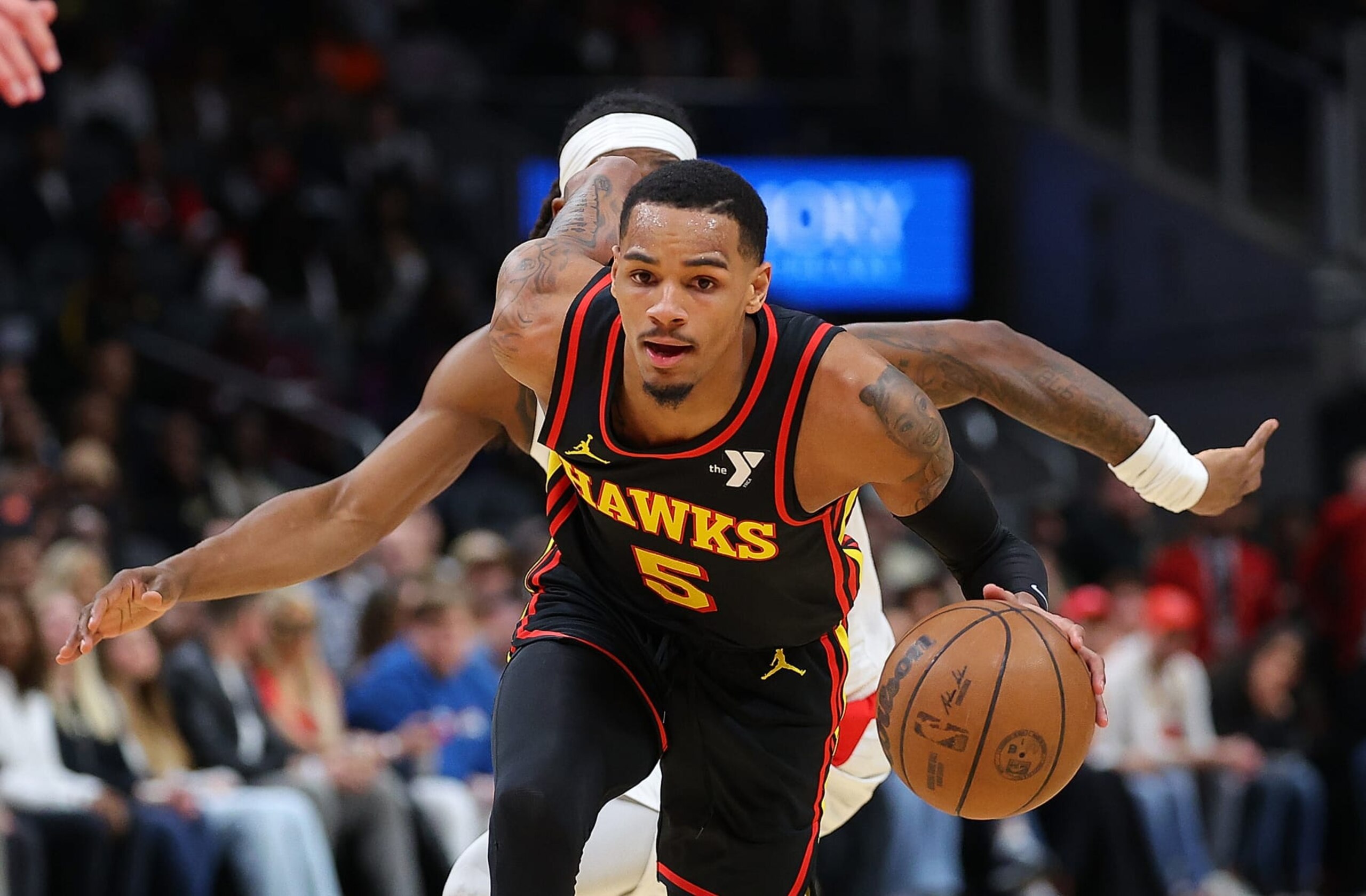 ATLANTA, GEORGIA - FEBRUARY 05: Dejounte Murray #5 of the Atlanta Hawks drives against Terance Mann #14 of the LA Clippers during the first quarter at State Farm Arena on February 05, 2024 in Atlanta, Georgia. NOTE TO USER: User expressly acknowledges and agrees that, by downloading and/or using this photograph, user is consenting to the terms and conditions of the Getty Images License Agreement. (Photo by Kevin C. Cox/Getty Images) ATLANTA, GEORGIA - FEBRUARY 05: Dejounte Murray #5 of the Atlanta Hawks drives against Terance Mann #14 of the LA Clippers during the first quarter at State Farm Arena on February 05, 2024 in Atlanta, Georgia. NOTE TO USER: User expressly acknowledges and agrees that, by downloading and/or using this photograph, user is consenting to the terms and conditions of the Getty Images License Agreement. (Photo by Kevin C. Cox/Getty Images)