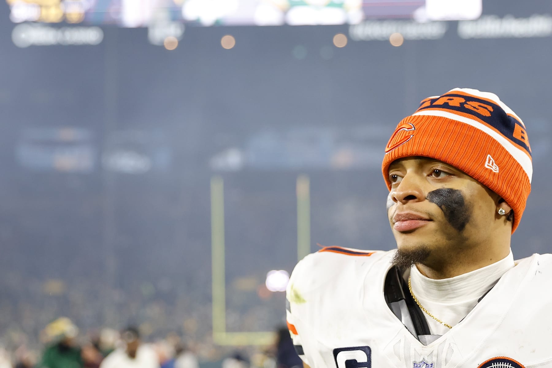 GREEN BAY, WISCONSIN - JANUARY 07: Justin Fields #1 of the Chicago Bears looks on after the game against the Green Bay Packers at Lambeau Field on January 07, 2024 in Green Bay, Wisconsin. (Photo by John Fisher/Getty Images)