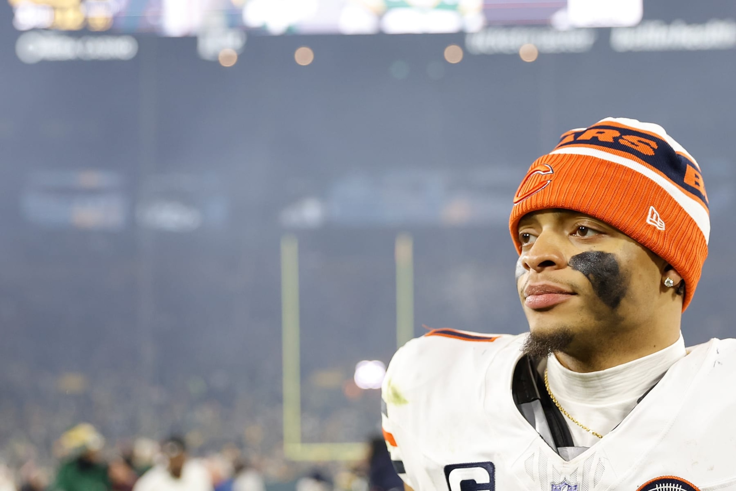 GREEN BAY, WISCONSIN - JANUARY 07: Justin Fields #1 of the Chicago Bears looks on after the game against the Green Bay Packers at Lambeau Field on January 07, 2024 in Green Bay, Wisconsin. (Photo by John Fisher/Getty Images)