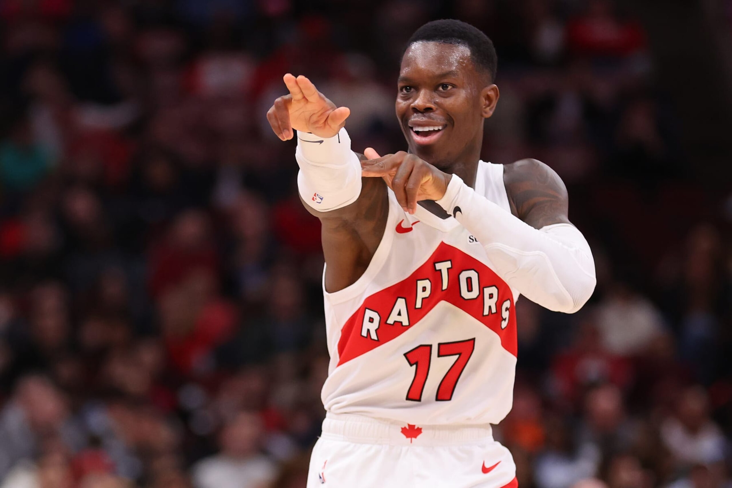 CHICAGO, ILLINOIS - JANUARY 30: Dennis Schroder #17 of the Toronto Raptors celebrates a basket by Jalen McDaniels #2 (not pictured) against the Chicago Bulls during the second half at the United Center on January 30, 2024 in Chicago, Illinois. NOTE TO USER: User expressly acknowledges and agrees that, by downloading and or using this photograph, User is consenting to the terms and conditions of the Getty Images License Agreement.  (Photo by Michael Reaves/Getty Images)