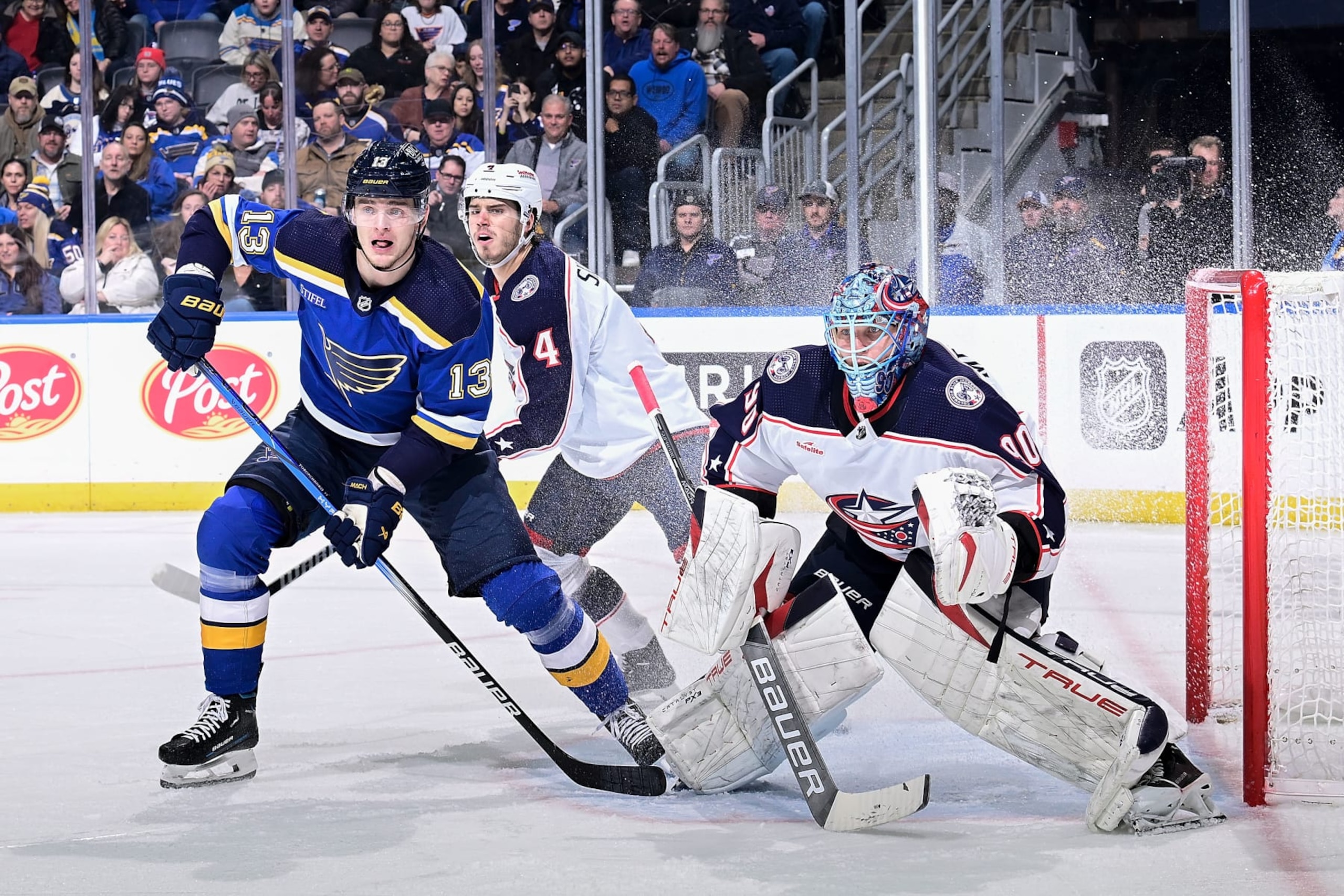 ST. LOUIS, MO - JANUARY 30: Elvis Merzlikins #90 of the Columbus Blue Jackets defends the net against Alexey Toropchenko #13 of the St. Louis Blues in the second period on January 30, 2024 at the Enterprise Center in St. Louis, Missouri. (Photo by Scott Rovak/NHLI via Getty Images)