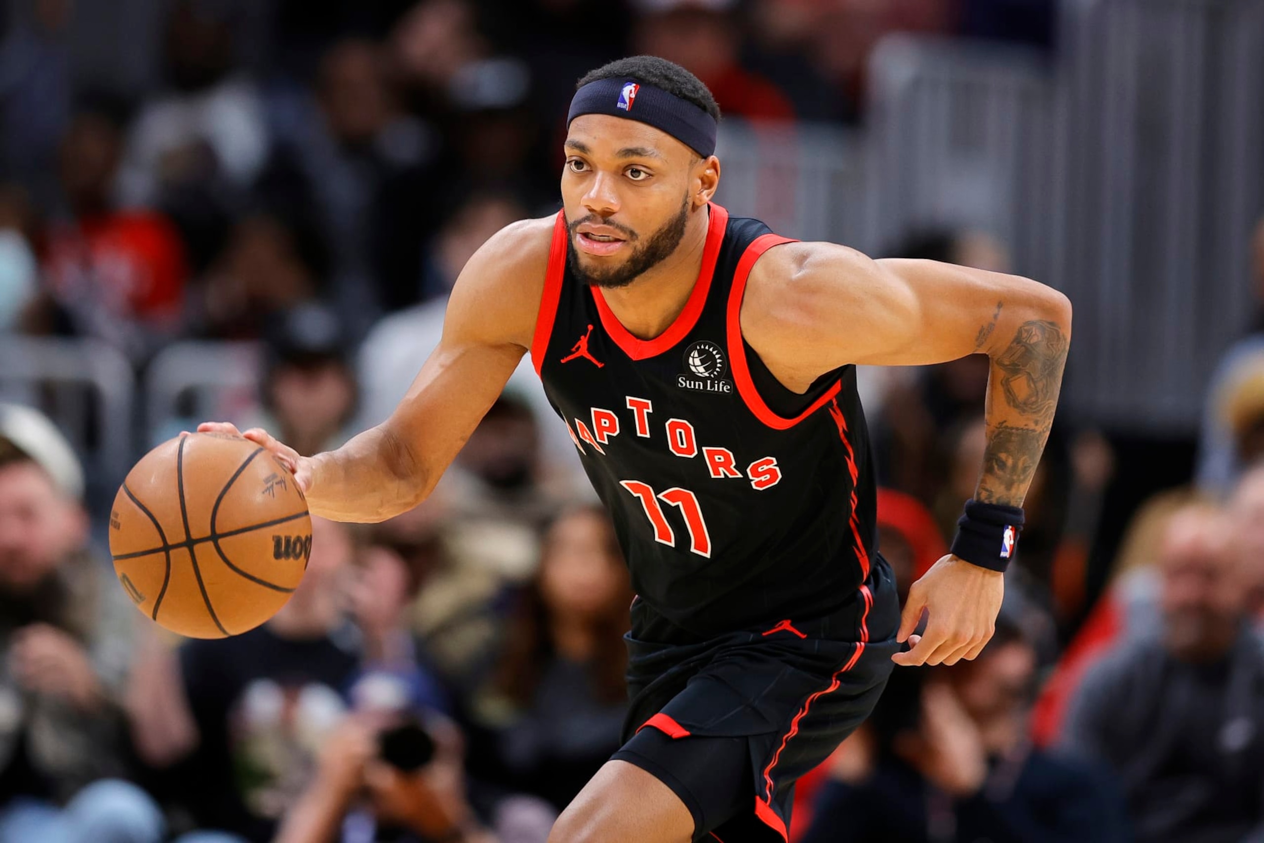 ATLANTA, GEORGIA - JANUARY 28: Bruce Brown #11 of the Toronto Raptors drives down court against the Atlanta Hawks during the second half at State Farm Arena on January 28, 2024 in Atlanta, Georgia. NOTE TO USER: User expressly acknowledges and agrees that, by downloading and or using this photograph, User is consenting to the terms and conditions of the Getty Images License Agreement. (Photo by Alex Slitz/Getty Images) ATLANTA, GEORGIA - JANUARY 28: Bruce Brown #11 of the Toronto Raptors drives down court against the Atlanta Hawks during the second half at State Farm Arena on January 28, 2024 in Atlanta, Georgia. NOTE TO USER: User expressly acknowledges and agrees that, by downloading and or using this photograph, User is consenting to the terms and conditions of the Getty Images License Agreement. (Photo by Alex Slitz/Getty Images)