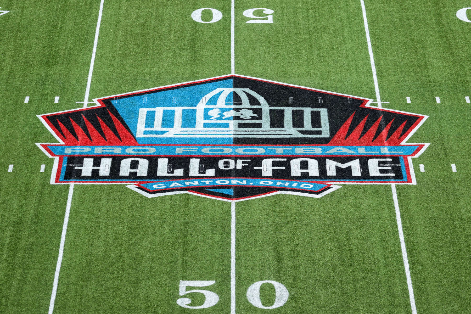 CANTON, OH - AUGUST 03: The Hall of Fame logo at midfield of Tom Benson Hall of Fame Stadium prior to the National Football League Hall of Fame preseason game between the New York Jets and Cleveland Browns on August 3, 2023, at the Tom Benson Hall of Fame Stadium in Canton, OH. (Photo by Frank Jansky/Icon Sportswire via Getty Images)
