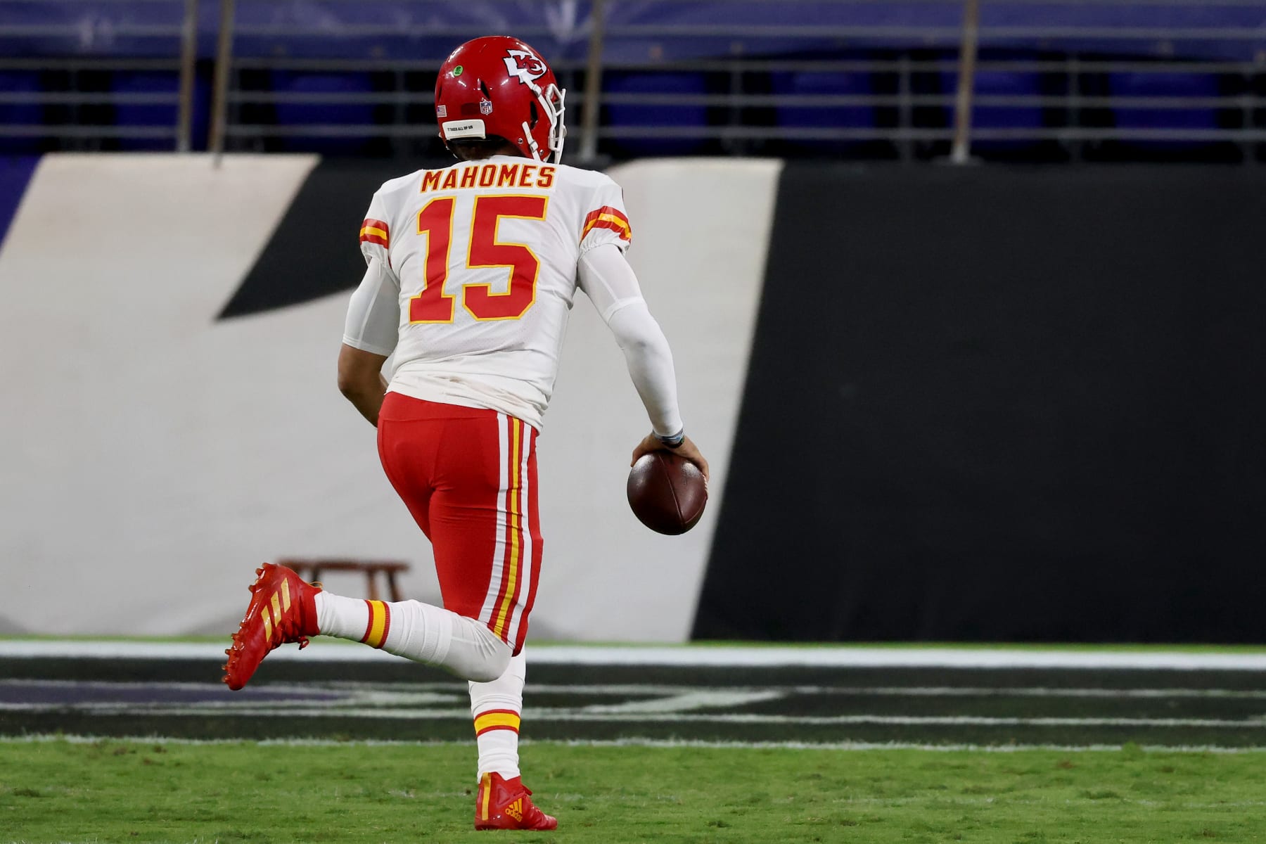BALTIMORE, MARYLAND - SEPTEMBER 28: Quarterback Patrick Mahomes #15 of the Kansas City Chiefs rushes for a touchdown against the Baltimore Ravens in the first half  at M&T Bank Stadium on September 28, 2020 in Baltimore, Maryland. (Photo by Rob Carr/Getty Images)