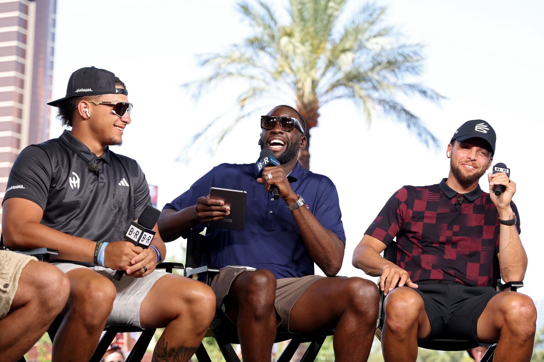LAS VEGAS, NEVADA - JUNE 29: (L-R) Patrick Mahomes, Draymond Green, and Steph Curry take part in the Bleacher Report Hot Seat Press Conference prior to Capital One's The Match VIII - Curry & Thompson vs. Mahomes & Kelce at Wynn Golf Club on June 29, 2023 in Las Vegas, Nevada. (Photo by Ezra Shaw/Getty Images for The Match)