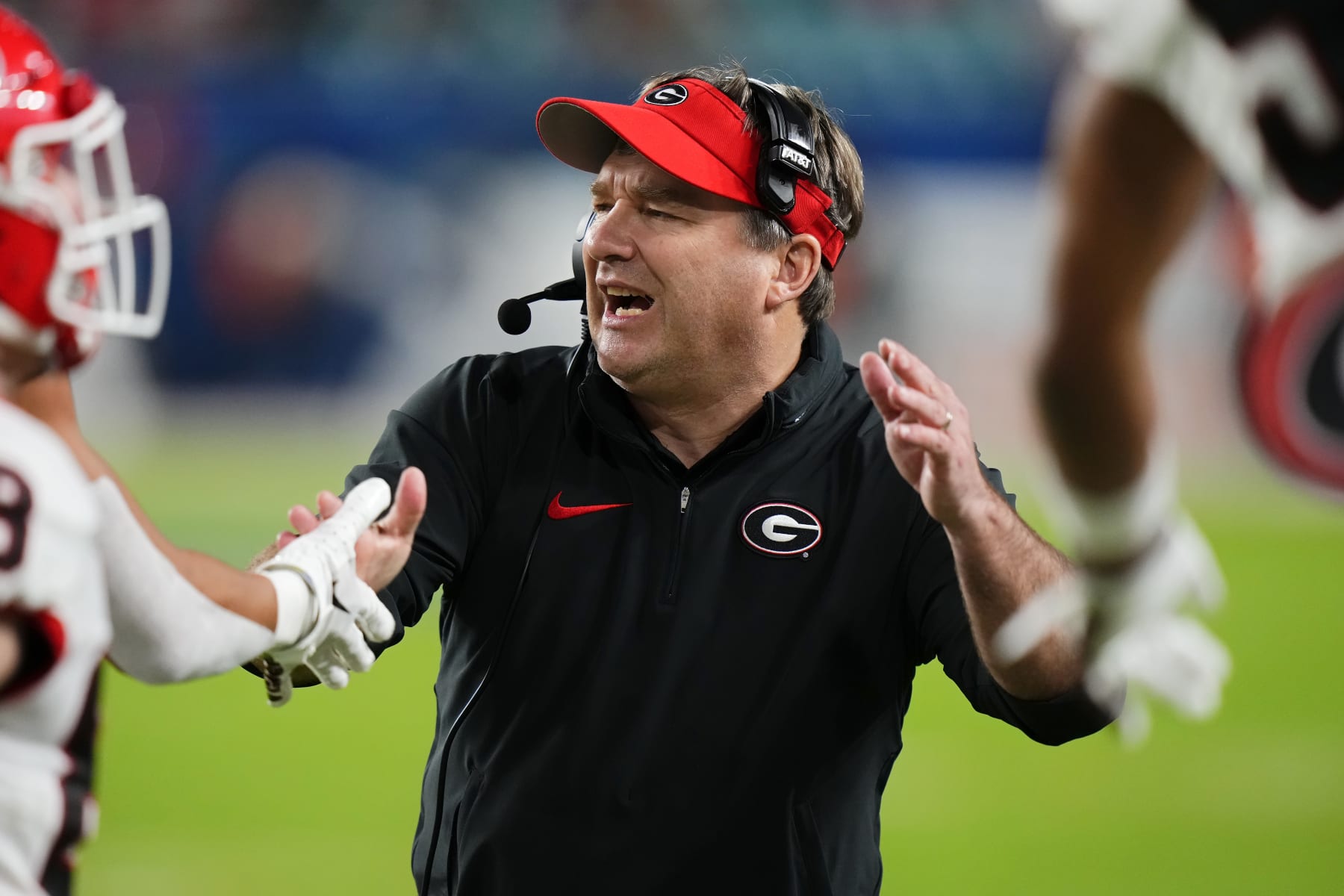 MIAMI GARDENS, FLORIDA - DECEMBER 30: Head coach Kirby Smart of the Georgia Bulldogs celebrates in the fourth quarter against the Florida State Seminoles during the Capital One Orange Bowl at Hard Rock Stadium on December 30, 2023 in Miami Gardens, Florida. (Photo by Rich Storry/Getty Images)