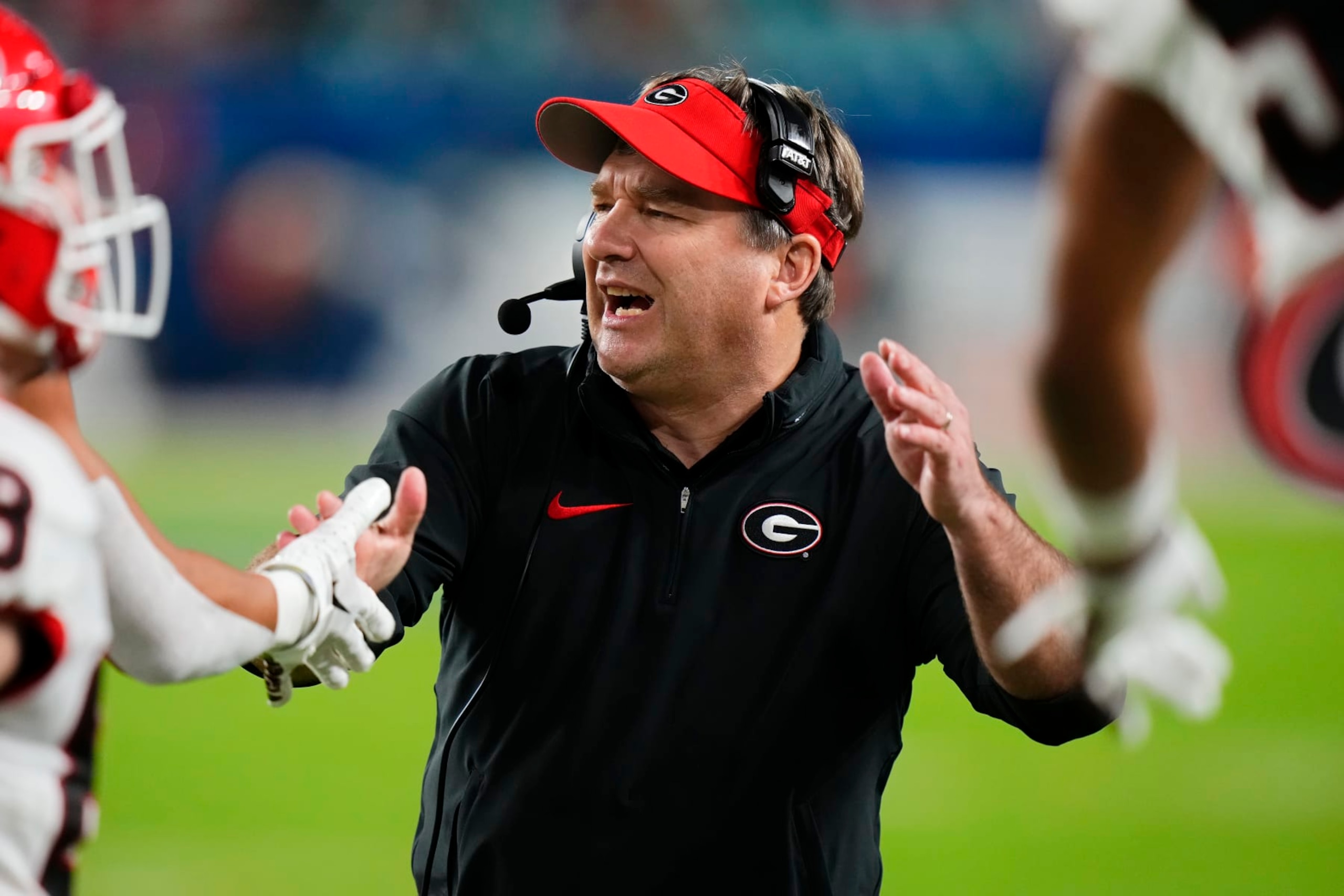 MIAMI GARDENS, FLORIDA - DECEMBER 30: Head coach Kirby Smart of the Georgia Bulldogs celebrates in the fourth quarter against the Florida State Seminoles during the Capital One Orange Bowl at Hard Rock Stadium on December 30, 2023 in Miami Gardens, Florida. (Photo by Rich Storry/Getty Images)