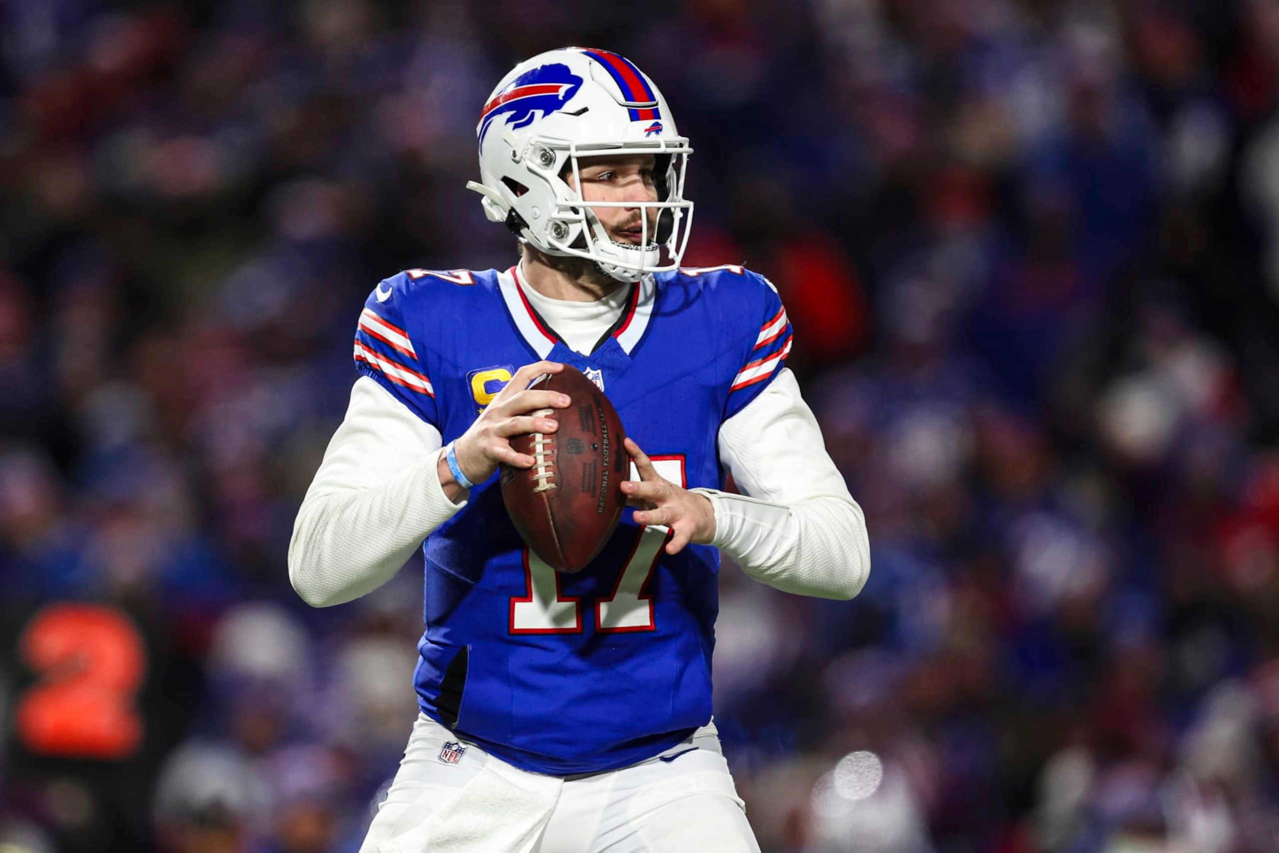 ORCHARD PARK, NY - JANUARY 21: Josh Allen #17 of the Buffalo Bills drops back to pass during an NFL divisional round playoff football game against the Kansas City Chiefs at Highmark Stadium on January 21, 2024 in Orchard Park, New York. (Photo by Perry Knotts/Getty Images)