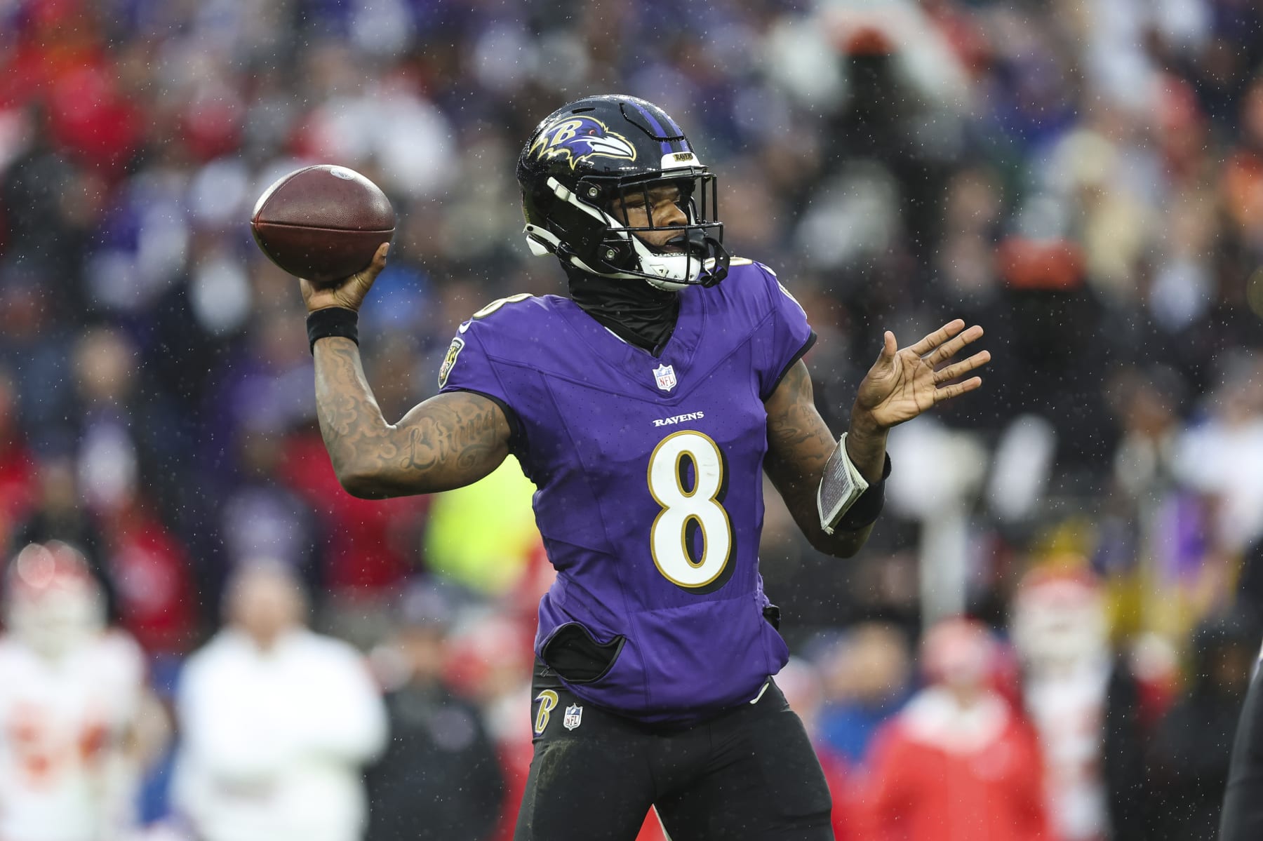 BALTIMORE, MD - JANUARY 28: Lamar Jackson #8 of the Baltimore Ravens throws the ball during the AFC Championship NFL football game against the Kansas City Chiefs at M&T Bank Stadium on January 28, 2024 in Baltimore, Maryland. (Photo by Perry Knotts/Getty Images)