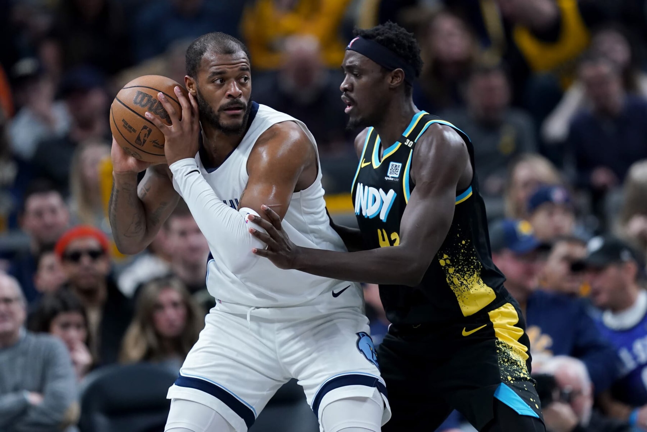 INDIANAPOLIS, INDIANA - JANUARY 28: Xavier Tillman #2 of the Memphis Grizzlies handles the ball while being guarded by Pascal Siakam #43 of the Indiana Pacers in the second quarter at Gainbridge Fieldhouse on January 28, 2024 in Indianapolis, Indiana. NOTE TO USER: User expressly acknowledges and agrees that, by downloading and or using this photograph, User is consenting to the terms and conditions of the Getty Images License Agreement. (Photo by Dylan Buell/Getty Images) INDIANAPOLIS, INDIANA - JANUARY 28: Xavier Tillman #2 of the Memphis Grizzlies handles the ball while being guarded by Pascal Siakam #43 of the Indiana Pacers in the second quarter at Gainbridge Fieldhouse on January 28, 2024 in Indianapolis, Indiana. NOTE TO USER: User expressly acknowledges and agrees that, by downloading and or using this photograph, User is consenting to the terms and conditions of the Getty Images License Agreement. (Photo by Dylan Buell/Getty Images)