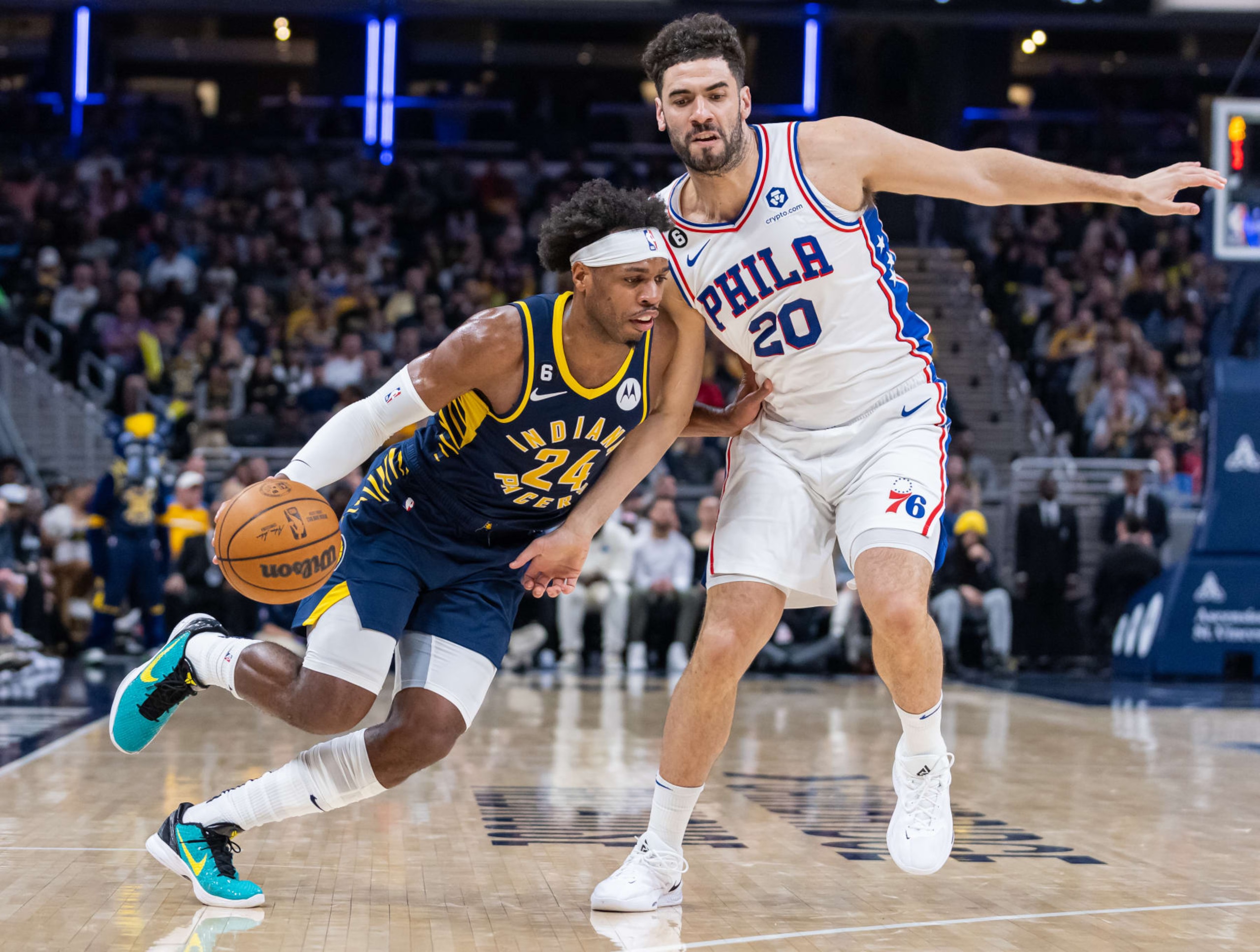 INDIANAPOLIS, IN - MARCH 06: Buddy Hield #24 of the Indiana Pacers dribbles against Georges Niang #20 of the Philadelphia 76ers at Gainbridge Fieldhouse on March 6, 2023 in Indianapolis, Indiana. NOTE TO USER: User expressly acknowledges and agrees that, by downloading and or using this photograph, User is consenting to the terms and conditions of the Getty Images License Agreement. (Photo by Michael Hickey/Getty Images) INDIANAPOLIS, IN - MARCH 06: Buddy Hield #24 of the Indiana Pacers dribbles against Georges Niang #20 of the Philadelphia 76ers at Gainbridge Fieldhouse on March 6, 2023 in Indianapolis, Indiana. NOTE TO USER: User expressly acknowledges and agrees that, by downloading and or using this photograph, User is consenting to the terms and conditions of the Getty Images License Agreement. (Photo by Michael Hickey/Getty Images)