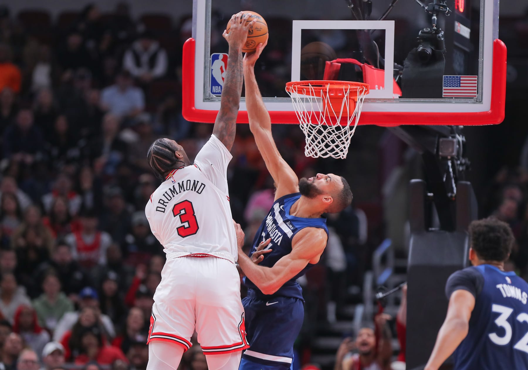 CHICAGO, IL - FEBRUARY 06: Andre Drummond #3 of the Chicago Bulls shoots the ball over Rudy Gobert #27 of the Minnesota Timberwolves during overtime at the United Center on February 6, 2024 in Chicago, Illinois. (Photo by Melissa Tamez/Icon Sportswire via Getty Images)