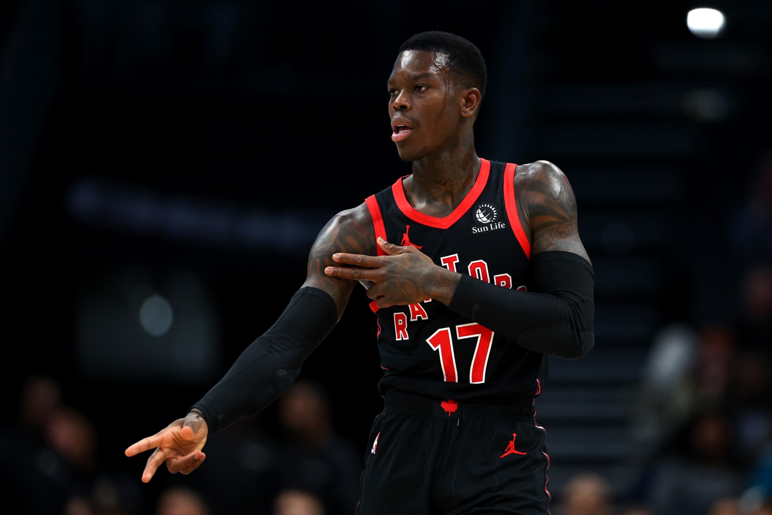 CHARLOTTE, NORTH CAROLINA - FEBRUARY 07: Dennis Schroder #17 of the Toronto Raptors reacts following a three point basket during the first half of the game against the Charlotte Hornets at Spectrum Center on February 07, 2024 in Charlotte, North Carolina. NOTE TO USER: User expressly acknowledges and agrees that, by downloading and or using this photograph, User is consenting to the terms and conditions of the Getty Images License Agreement. (Photo by Jared C. Tilton/Getty Images)