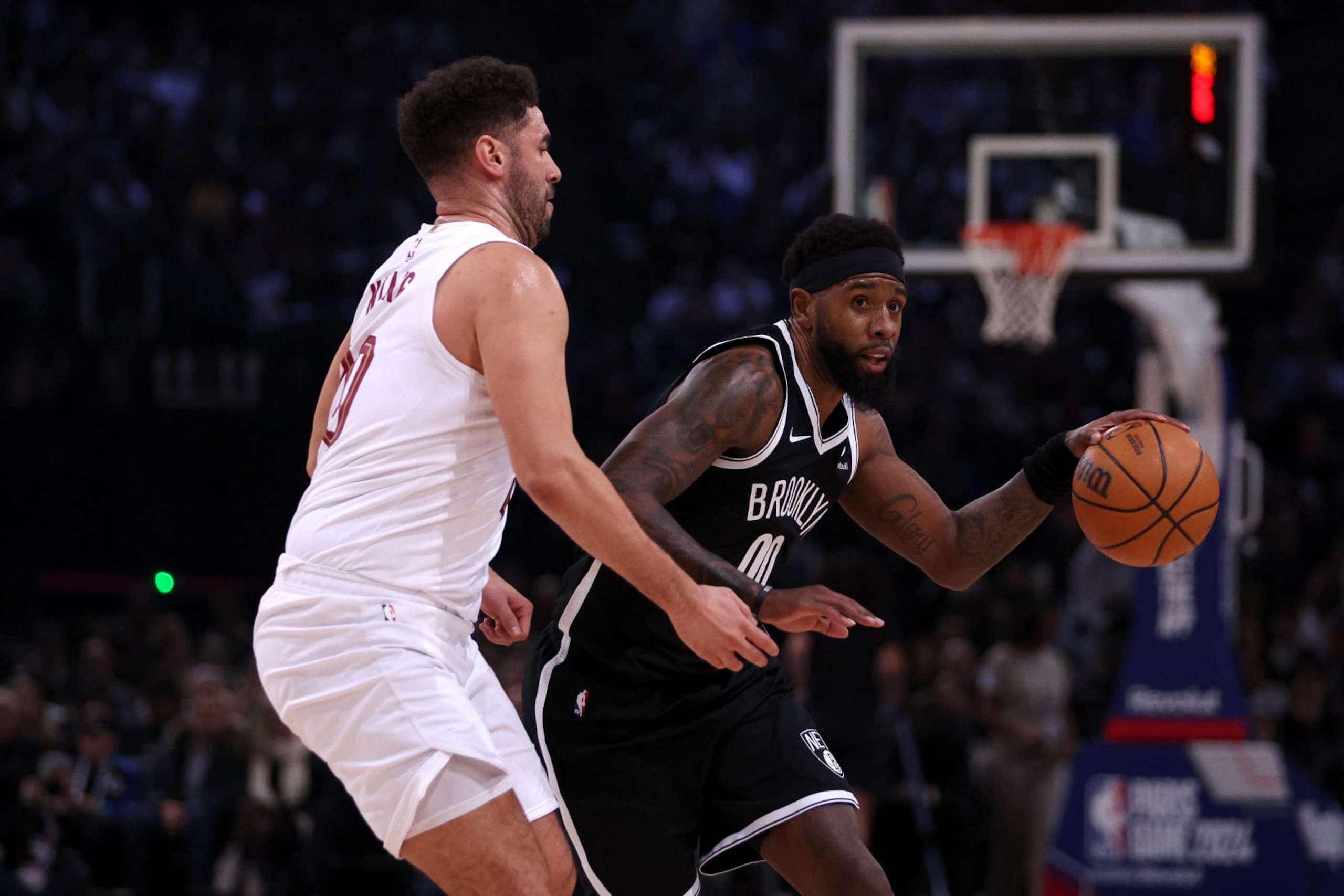PARIS, FRANCE - JANUARY 11:  Royce O'Neale of Brooklyn Nets runs at Georges Niang of Cleveland Cavaliers during the NBA match between Brooklyn Nets and Cleveland Cavaliers at The Accor Arena on January 11, 2024 in Paris, France.  (Photo by Dean Mouhtaropoulos/Getty Images)