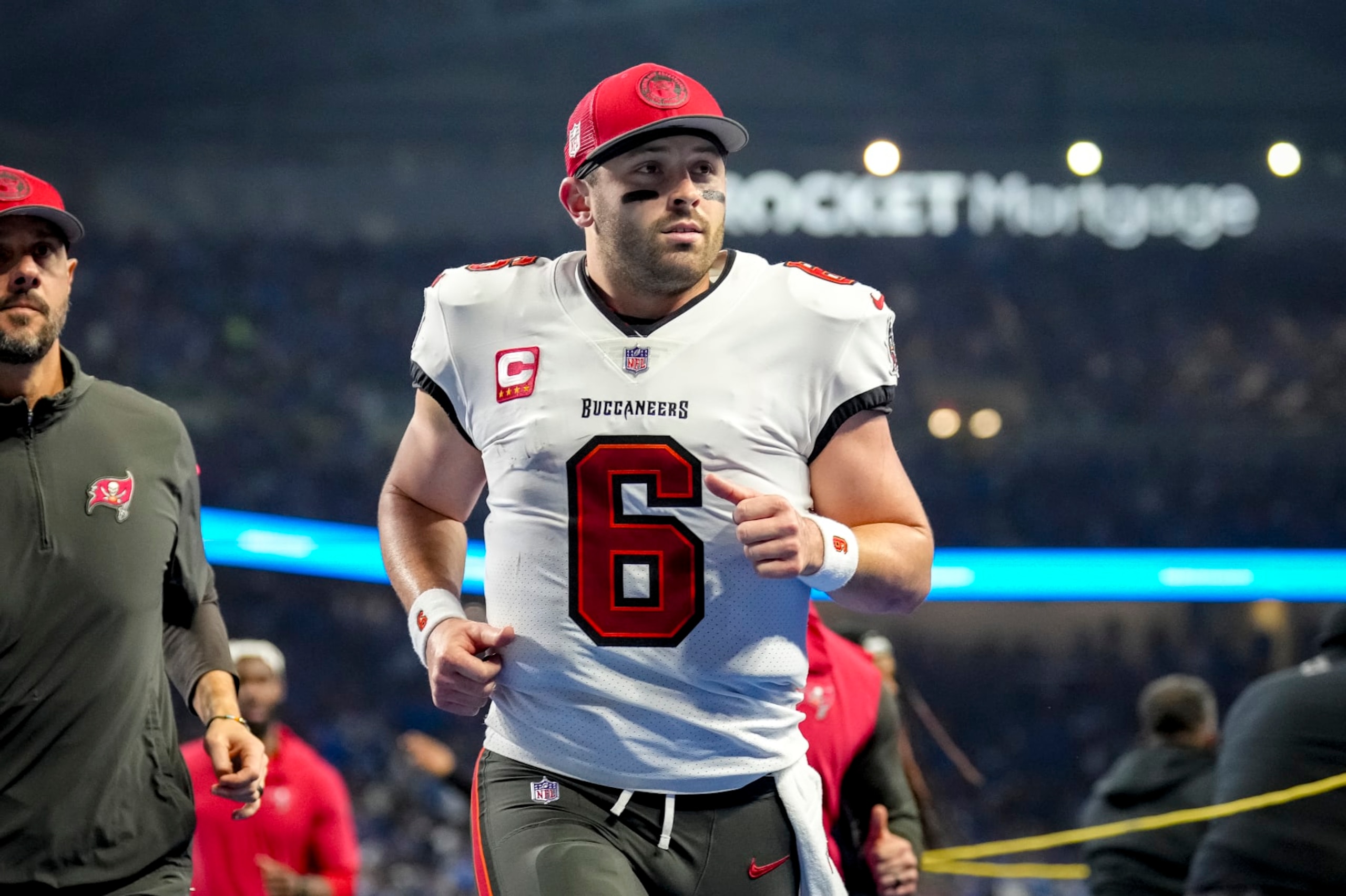 DETROIT, MICHIGAN - JANUARY 21: Baker Mayfield #6 of the Tampa Bay Buccaneers runs off the field against the Detroit Lions at Ford Field on January 21, 2024 in Detroit, Michigan. (Photo by Nic Antaya/Getty Images)