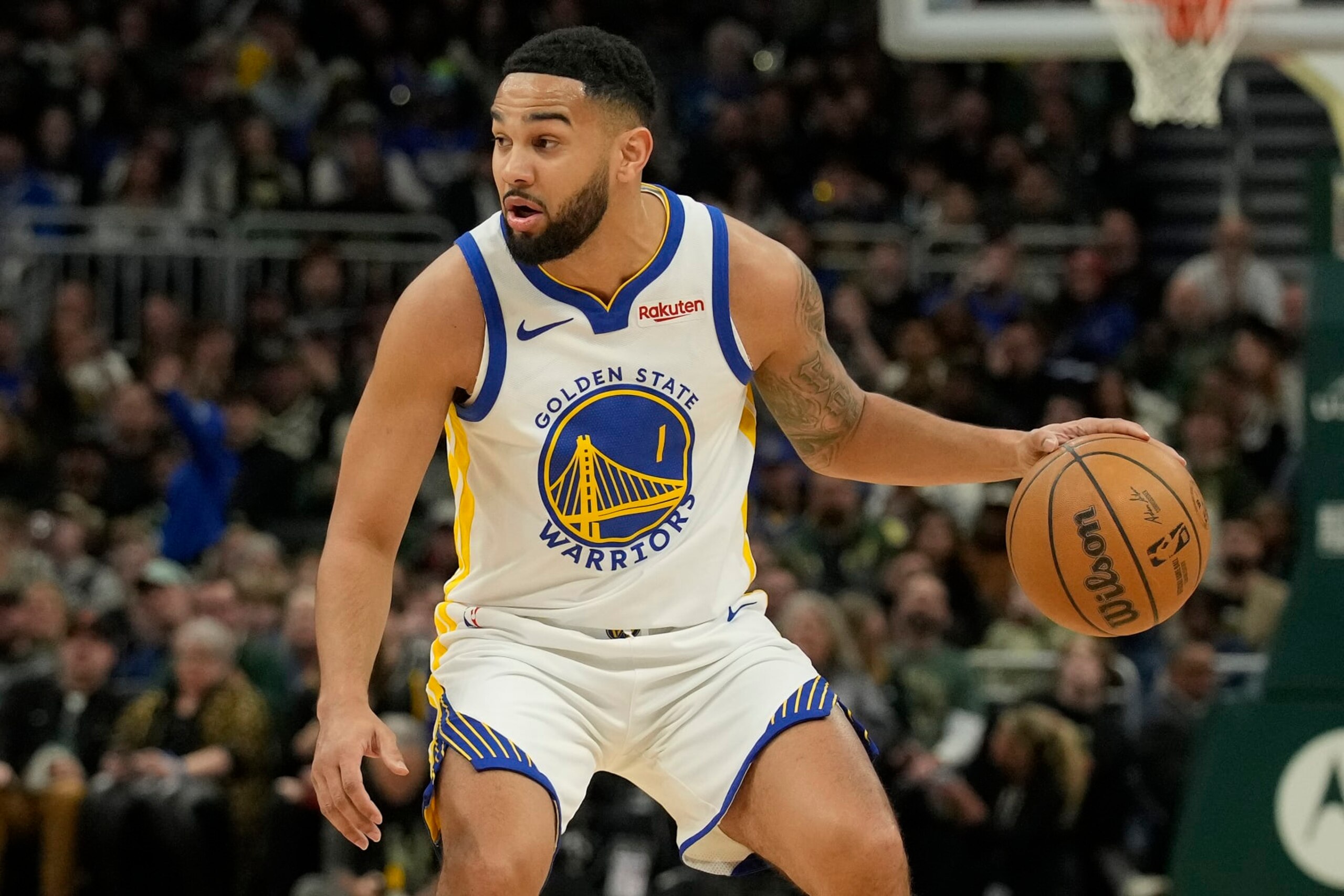MILWAUKEE, WISCONSIN - JANUARY 13: Cory Joseph #1 of the Golden State Warriors dribbles the ball in the first half against the Milwaukee Bucks at Fiserv Forum on January 13, 2024 in Milwaukee, Wisconsin. NOTE TO USER: User expressly acknowledges and agrees that, by downloading and or using this photograph, User is consenting to the terms and conditions of the Getty Images License Agreement. (Photo by Patrick McDermott/Getty Images)