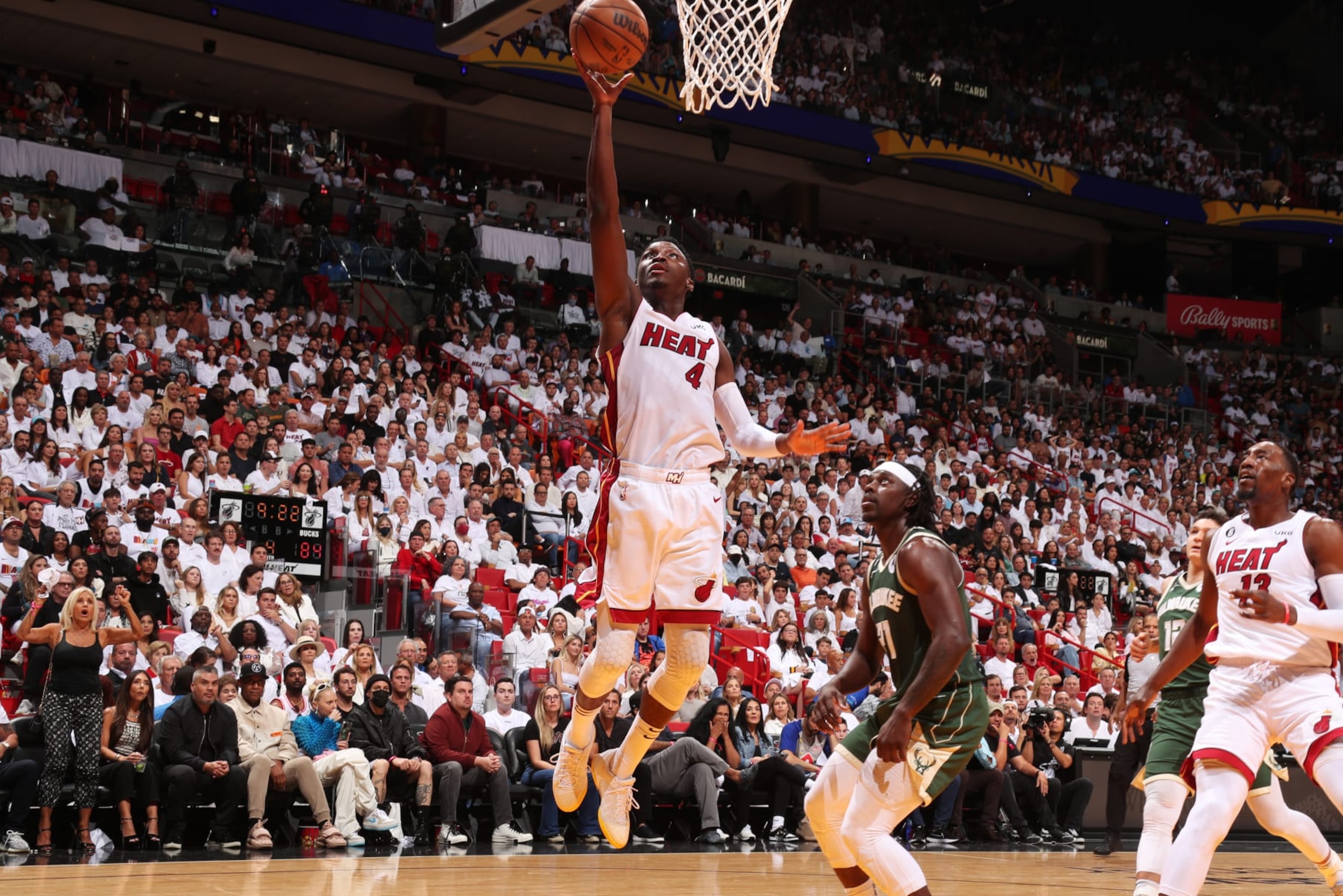 MIAMI, FL - APRIL 22: Victor Oladipo #4 of the Miami Heat drives to the basket during Round 1 Game 3 of the 2023 NBA Playoffs against the Milwaukee Bucks on April 22, 2023 at Kaseya Center in Miami, Florida. NOTE TO USER: User expressly acknowledges and agrees that, by downloading and or using this Photograph, user is consenting to the terms and conditions of the Getty Images License Agreement. Mandatory Copyright Notice: Copyright 2023 NBAE (Photo by Issac Baldizon/NBAE via Getty Images)