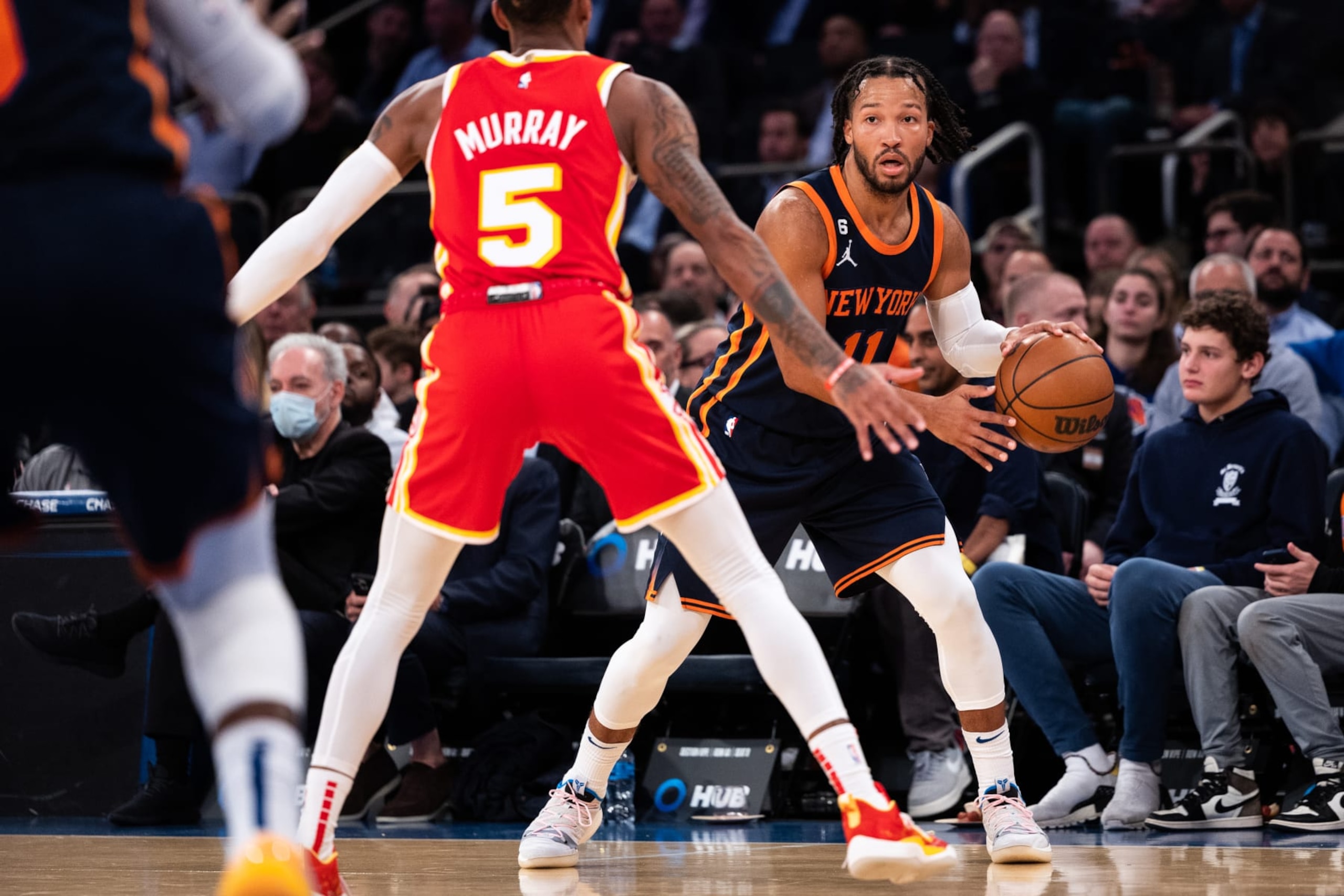 NEW YORK, NEW YORK - NOVEMBER 02: Jalen Brunson #11 of the New York Knicks is guarded by Dejounte Murray #5 of the Atlanta Hawks during the third quarter of the game against the Atlanta Hawks at Madison Square Garden on November 02, 2022 in New York City. NOTE TO USER: User expressly acknowledges and agrees that, by downloading and or using this photograph, User is consenting to the terms and conditions of the Getty Images License Agreement. (Photo by Dustin Satloff/Getty Images) NEW YORK, NEW YORK - NOVEMBER 02: Jalen Brunson #11 of the New York Knicks is guarded by Dejounte Murray #5 of the Atlanta Hawks during the third quarter of the game against the Atlanta Hawks at Madison Square Garden on November 02, 2022 in New York City. NOTE TO USER: User expressly acknowledges and agrees that, by downloading and or using this photograph, User is consenting to the terms and conditions of the Getty Images License Agreement. (Photo by Dustin Satloff/Getty Images)
