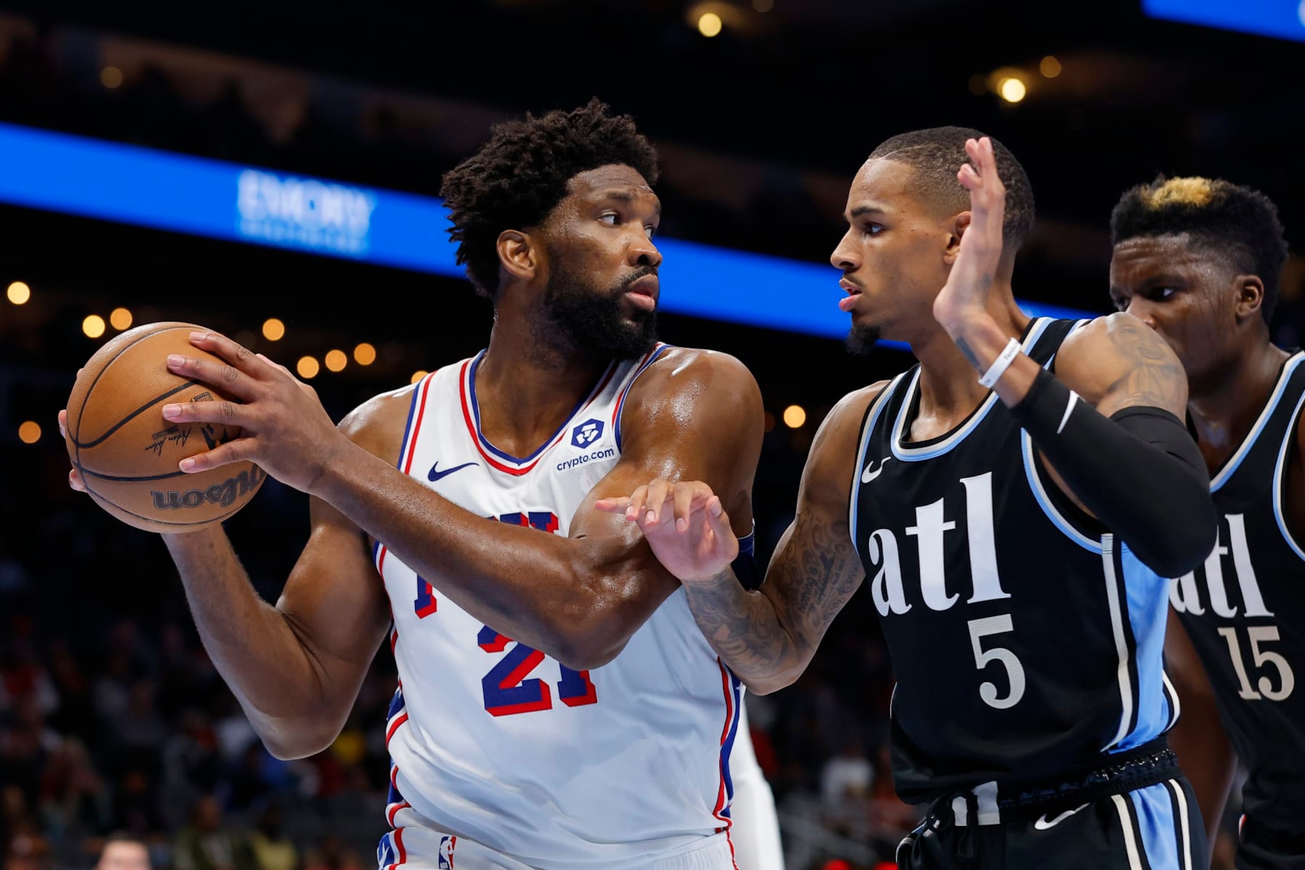ATLANTA, GEORGIA - NOVEMBER 17: Joel Embiid #21 of the Philadelphia 76ers looks to pass around Dejounte Murray #5 of the Atlanta Hawks during the second half of an NBA In-Season Tournament game at State Farm Arena on November 17, 2023 in Atlanta, Georgia. NOTE TO USER: User expressly acknowledges and agrees that, by downloading and or using this photograph, User is consenting to the terms and conditions of the Getty Images License Agreement. (Photo by Todd Kirkland/Getty Images) ATLANTA, GEORGIA - NOVEMBER 17: Joel Embiid #21 of the Philadelphia 76ers looks to pass around Dejounte Murray #5 of the Atlanta Hawks during the second half of an NBA In-Season Tournament game at State Farm Arena on November 17, 2023 in Atlanta, Georgia. NOTE TO USER: User expressly acknowledges and agrees that, by downloading and or using this photograph, User is consenting to the terms and conditions of the Getty Images License Agreement. (Photo by Todd Kirkland/Getty Images)