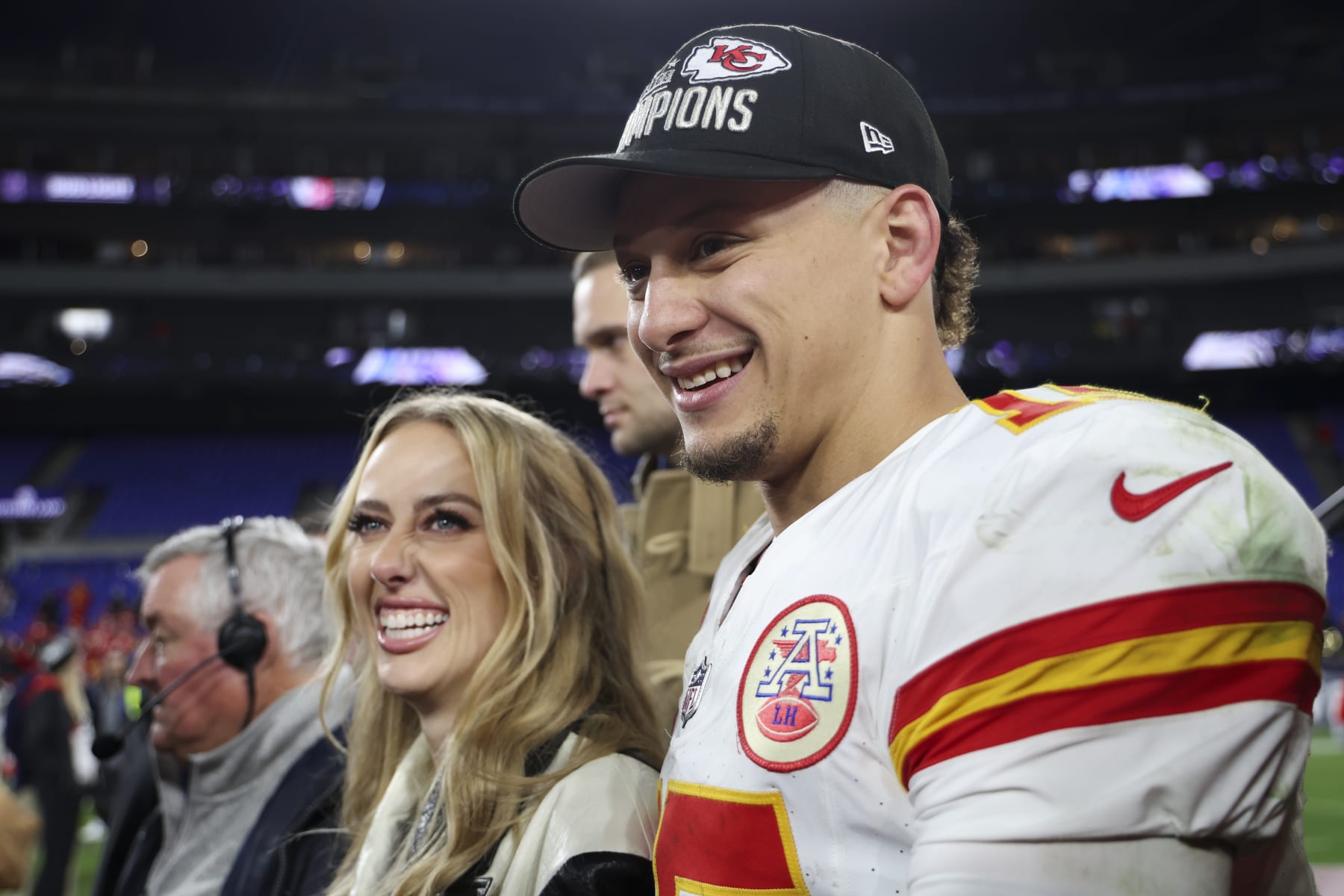 BALTIMORE, MARYLAND - JANUARY 28: Patrick Mahomes #15 of the Kansas City Chiefs smiles next to his wife Brittany Mahomes after the AFC championship game against the Baltimore Ravens at M&T Bank Stadium on January 28, 2024 in Baltimore, Maryland. (Photo by Kara Durrette/Getty Images)