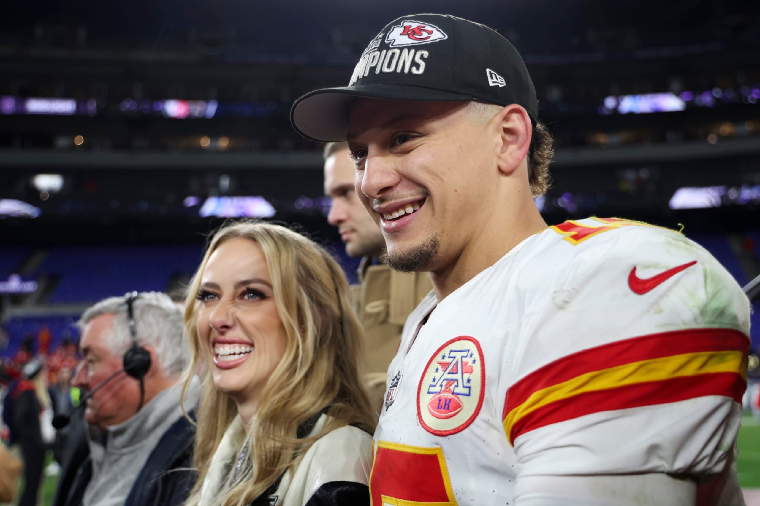 BALTIMORE, MARYLAND - JANUARY 28: Patrick Mahomes #15 of the Kansas City Chiefs smiles next to his wife Brittany Mahomes after the AFC championship game against the Baltimore Ravens at M&T Bank Stadium on January 28, 2024 in Baltimore, Maryland. (Photo by Kara Durrette/Getty Images)