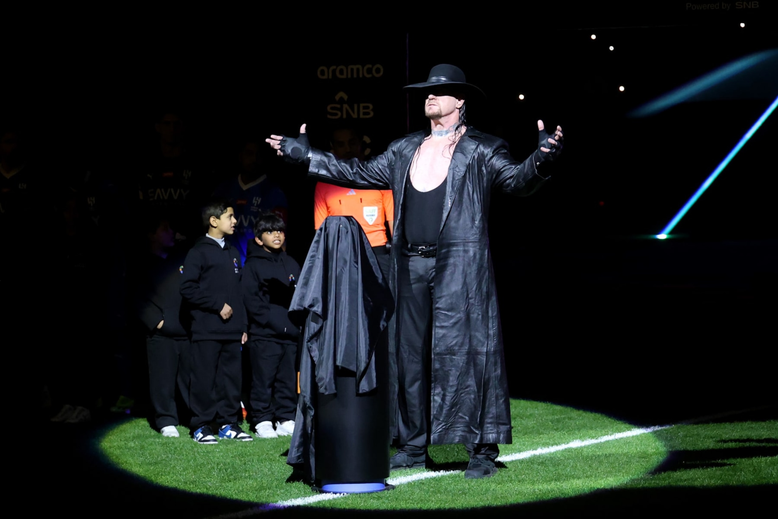 RIYADH, SAUDI ARABIA - FEBRUARY 08: American retired professional wrestler, Mark William Calaway, aka 'The Undertaker', is presented prior to the Riyadh Season Cup Final match between Al Hilal and Al-Nassr at Kingdom Arena on February 08, 2024 in Riyadh, Saudi Arabia. (Photo by Yasser Bakhsh/Getty Images)