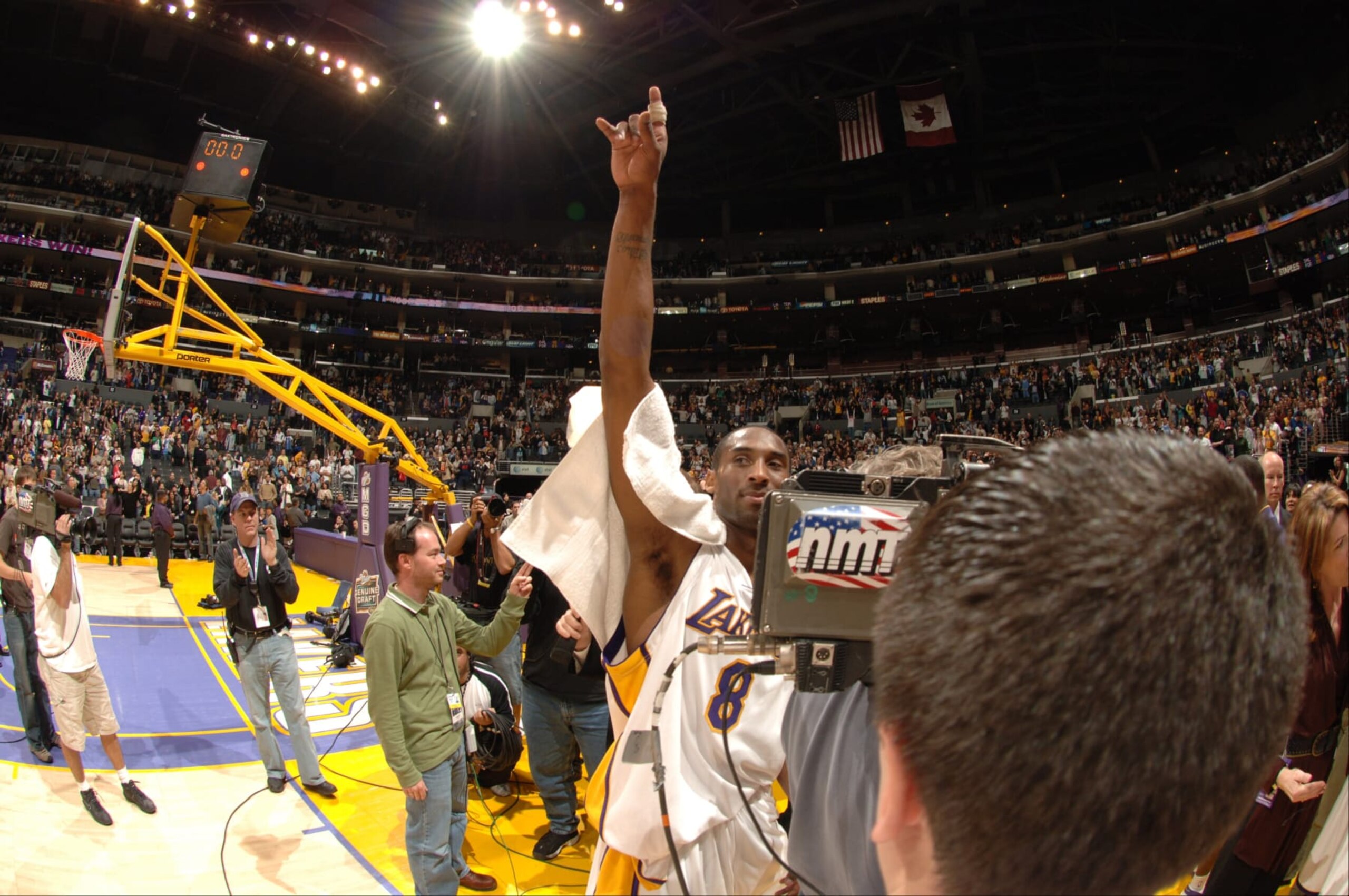 LOS ANGELES - JANUARY 22:  Kobe Bryant #8 of the Los Angeles Lakers walks off the court after scoring 81 points against the Toronto Raptors on January 22, 2006 at Staples Center in Los Angeles, California. Bryant scored 81 points in the Lakers 122-104 win over the Raptors.  NOTE TO USER: User expressly acknowledges and agrees that, by downloading and/or using this Photograph, user is consenting to the terms and conditions of the Getty Images License Agreement. Mandatory Copyright Notice: Copyright 2006 NBAE (Photo by Noah Graham/NBAE via Getty Images)