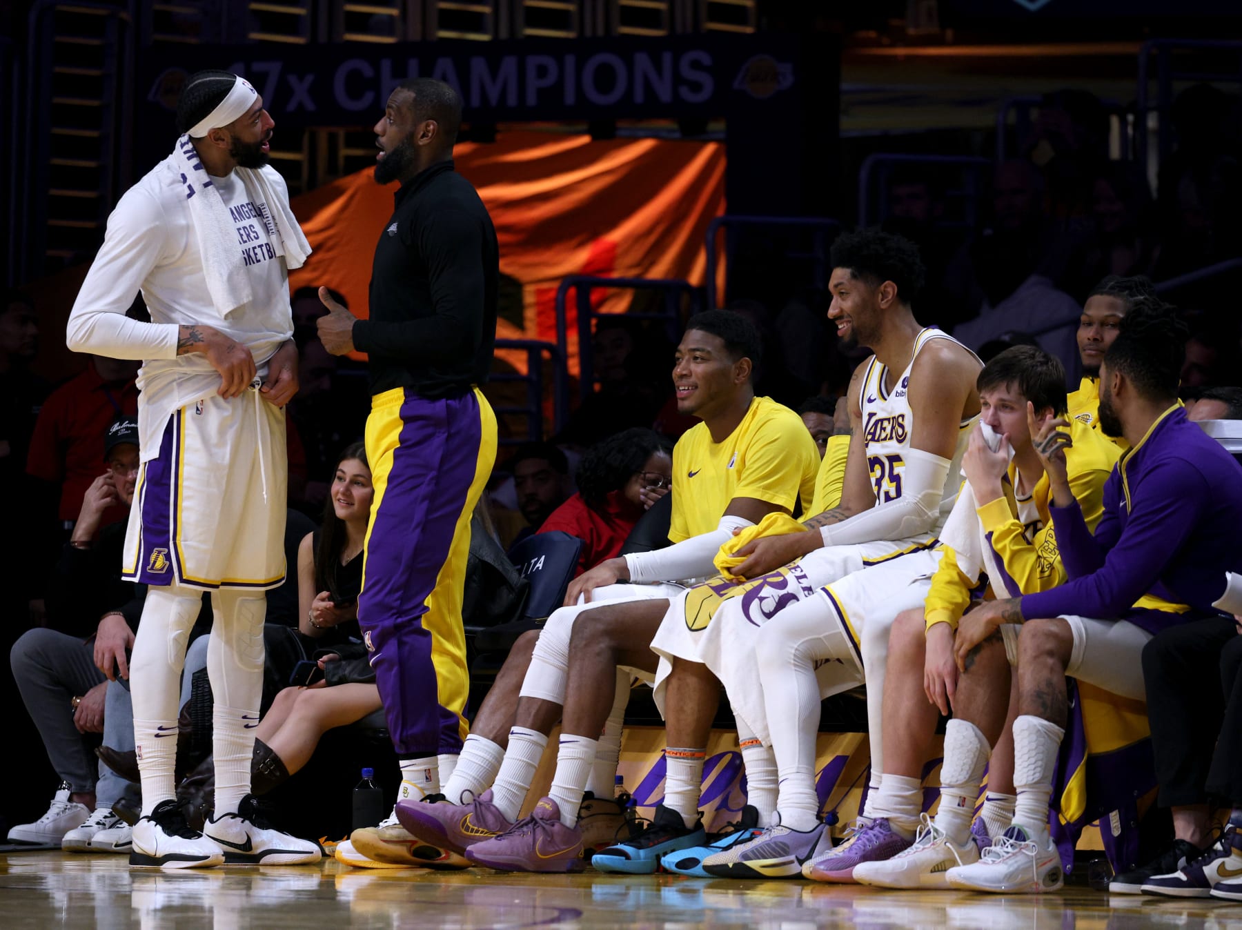 LOS ANGELES, CALIFORNIA - JANUARY 21: Rui Hachimura #28 of the Los Angeles Lakers laughs on the bench with Christian Wood #35 as LeBron James #23 and Anthony Davis #3 talk during a 134-110 win over the Portland Trail Blazers at Crypto.com Arena on January 21, 2024 in Los Angeles, California. User is consenting to the terms and conditions of the Getty Images License Agreement. (Photo by Harry How/Getty Images)