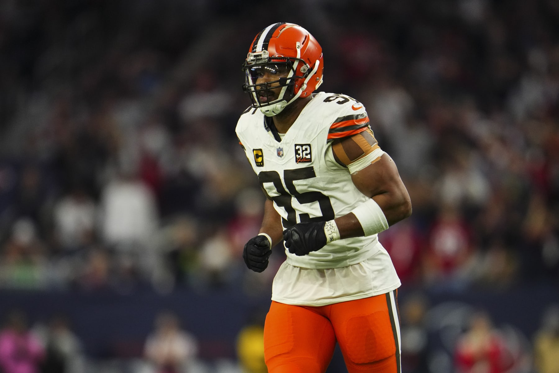 HOUSTON, TX - JANUARY 13: Myles Garrett #95 of the Cleveland Browns runs across the field during an NFL wild-card playoff football game against the Houston Texans at NRG Stadium on January 13, 2024 in Houston, Texas. (Photo by Cooper Neill/Getty Images)