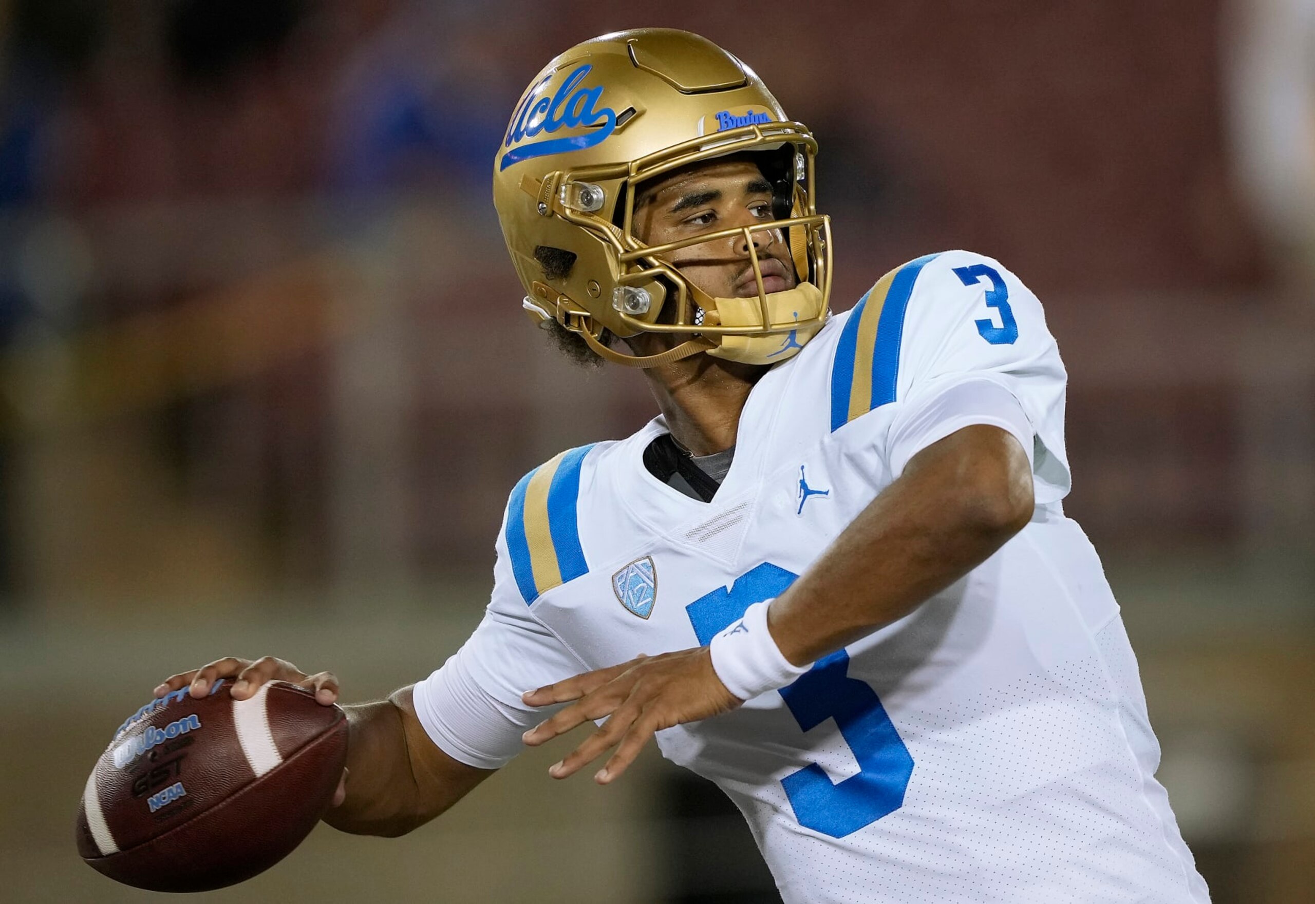 STANFORD, CALIFORNIA - OCTOBER 21: Dante Moore #3 of the UCLA Bruins warms up during pregame warm ups prior to the start of the game against the Stanford Cardinal at Stanford Stadium on October 21, 2023 in Stanford, California. (Photo by Thearon W. Henderson/Getty Images)