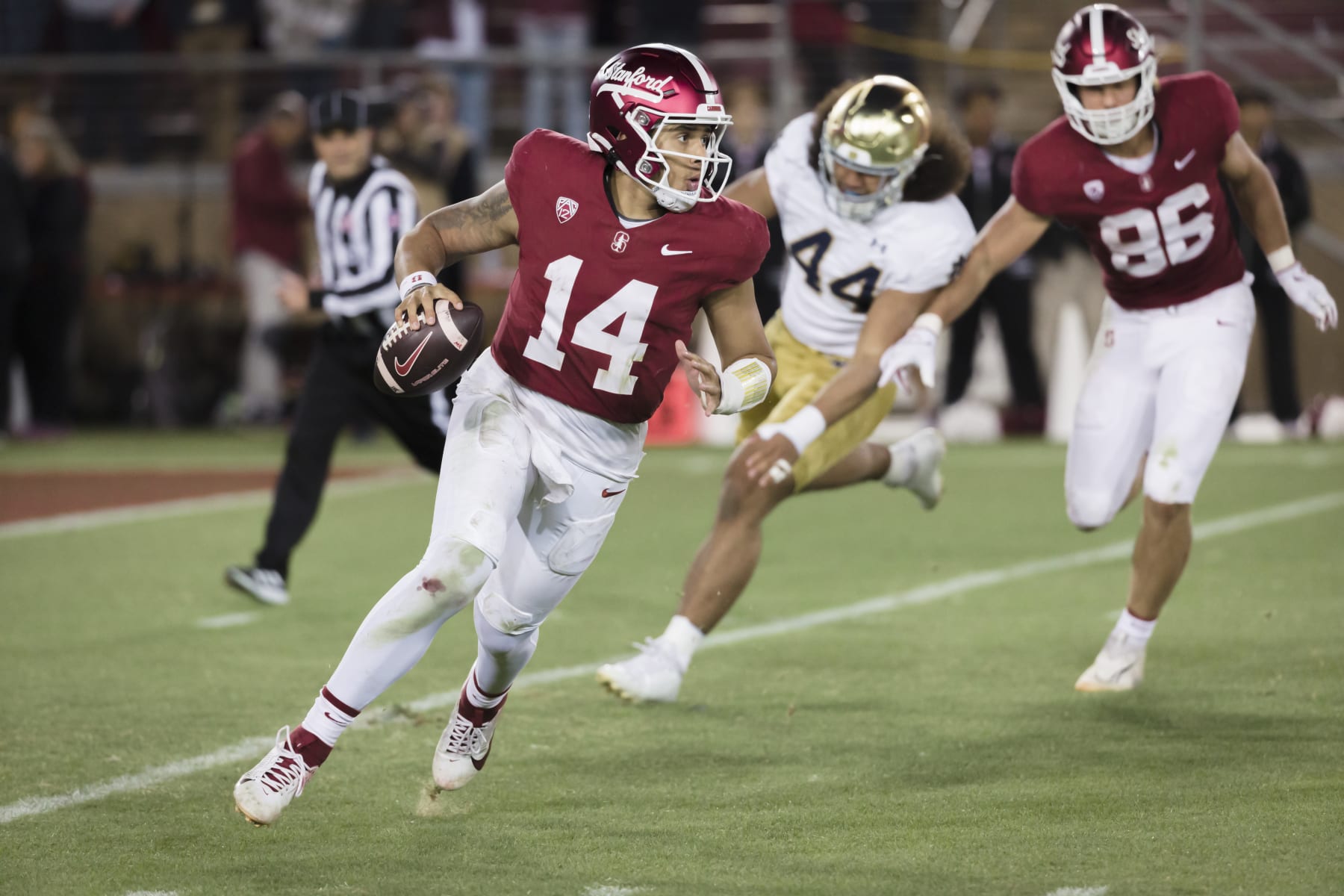 PALO ALTO, CA - NOVEMBER 25:  Ashton Daniels #14 of the Stanford Cardinal attempts a pass during a college football game against the Notre Dame Fighting Irish on November 25, 2023 at Stanford Stadium in Palo Alto, California.  (Photo by David Madison/Getty Images)