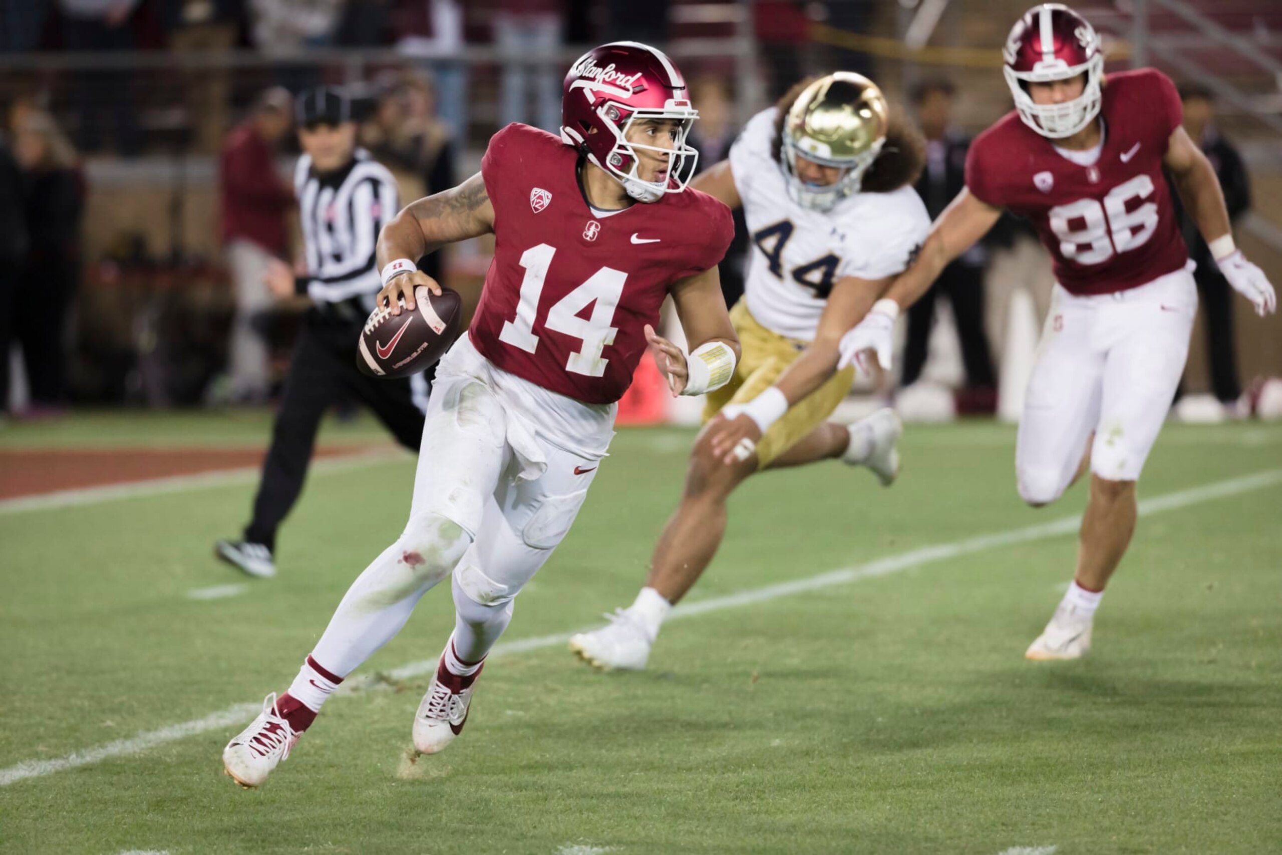 PALO ALTO, CA - NOVEMBER 25:  Ashton Daniels #14 of the Stanford Cardinal attempts a pass during a college football game against the Notre Dame Fighting Irish on November 25, 2023 at Stanford Stadium in Palo Alto, California.  (Photo by David Madison/Getty Images)
