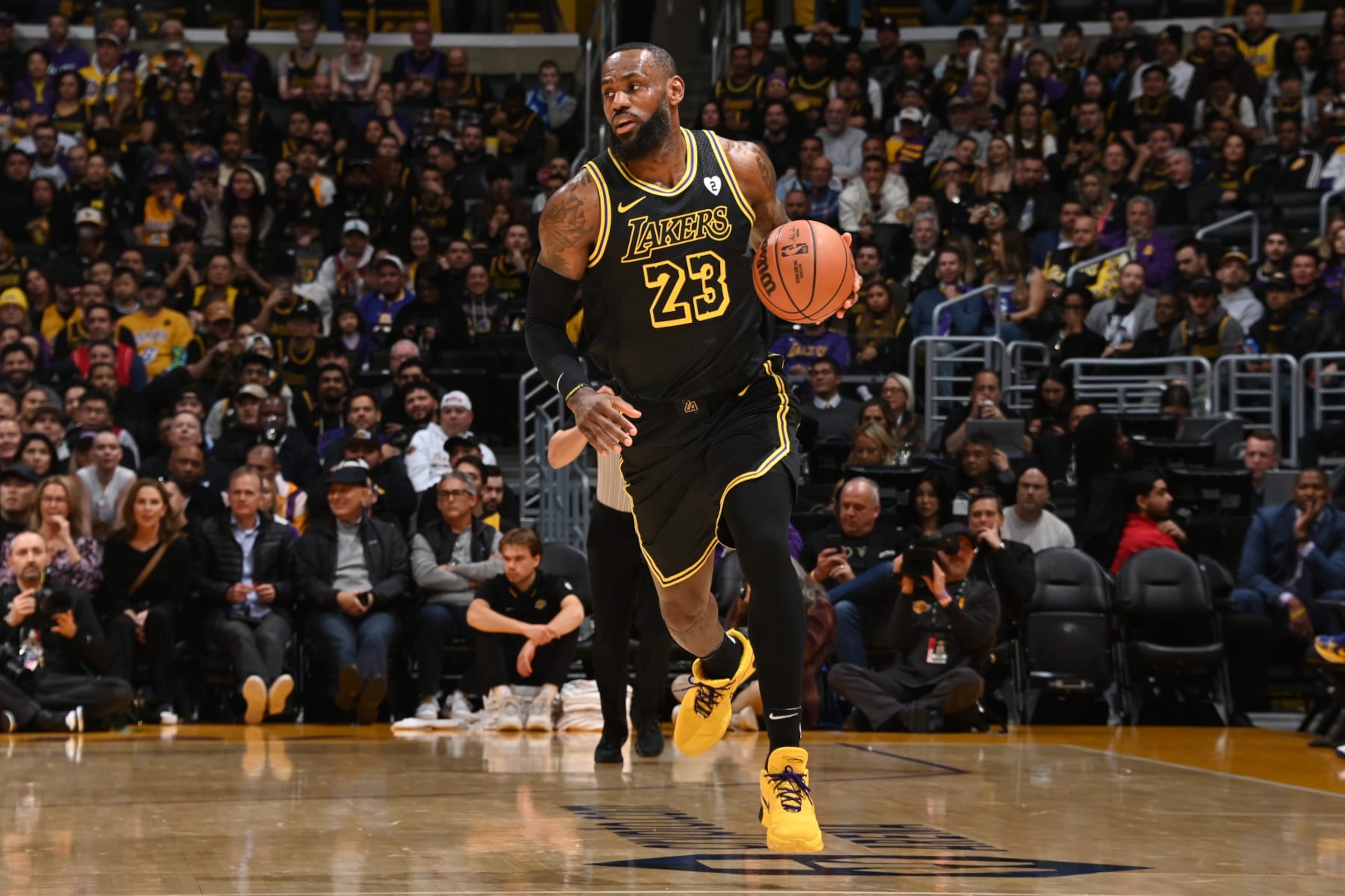 LOS ANGELES, CA - FEBRUARY 8: LeBron James #23 of the Los Angeles Lakers dribbles the ball during the game against the Denver Nuggets on Feburary 8, 2024 at Crypto.Com Arena in Los Angeles, California. NOTE TO USER: User expressly acknowledges and agrees that, by downloading and/or using this Photograph, user is consenting to the terms and conditions of the Getty Images License Agreement. Mandatory Copyright Notice: Copyright 2024 NBAE (Photo by Andrew D. Bernstein/NBAE via Getty Images) LOS ANGELES, CA - FEBRUARY 8: LeBron James #23 of the Los Angeles Lakers dribbles the ball during the game against the Denver Nuggets on Feburary 8, 2024 at Crypto.Com Arena in Los Angeles, California. NOTE TO USER: User expressly acknowledges and agrees that, by downloading and/or using this Photograph, user is consenting to the terms and conditions of the Getty Images License Agreement. Mandatory Copyright Notice: Copyright 2024 NBAE (Photo by Andrew D. Bernstein/NBAE via Getty Images)