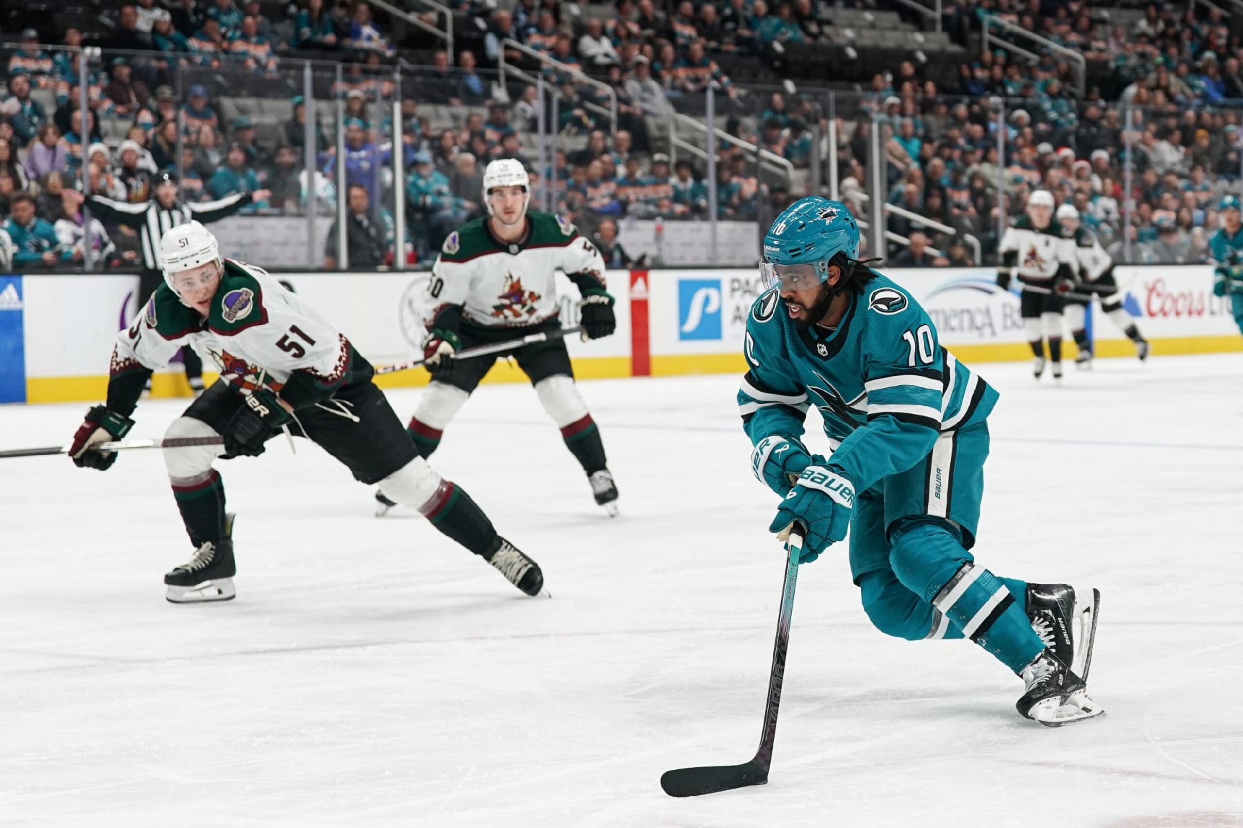 SAN JOSE, CA - DECEMBER 21: Anthony Duclair #10 of the San Jose Sharks skates with the puck against the Arizona Coyotes at SAP Center on December 21, 2023 in San Jose, California. (Photo by Kavin Mistry/NHLI via Getty Images)