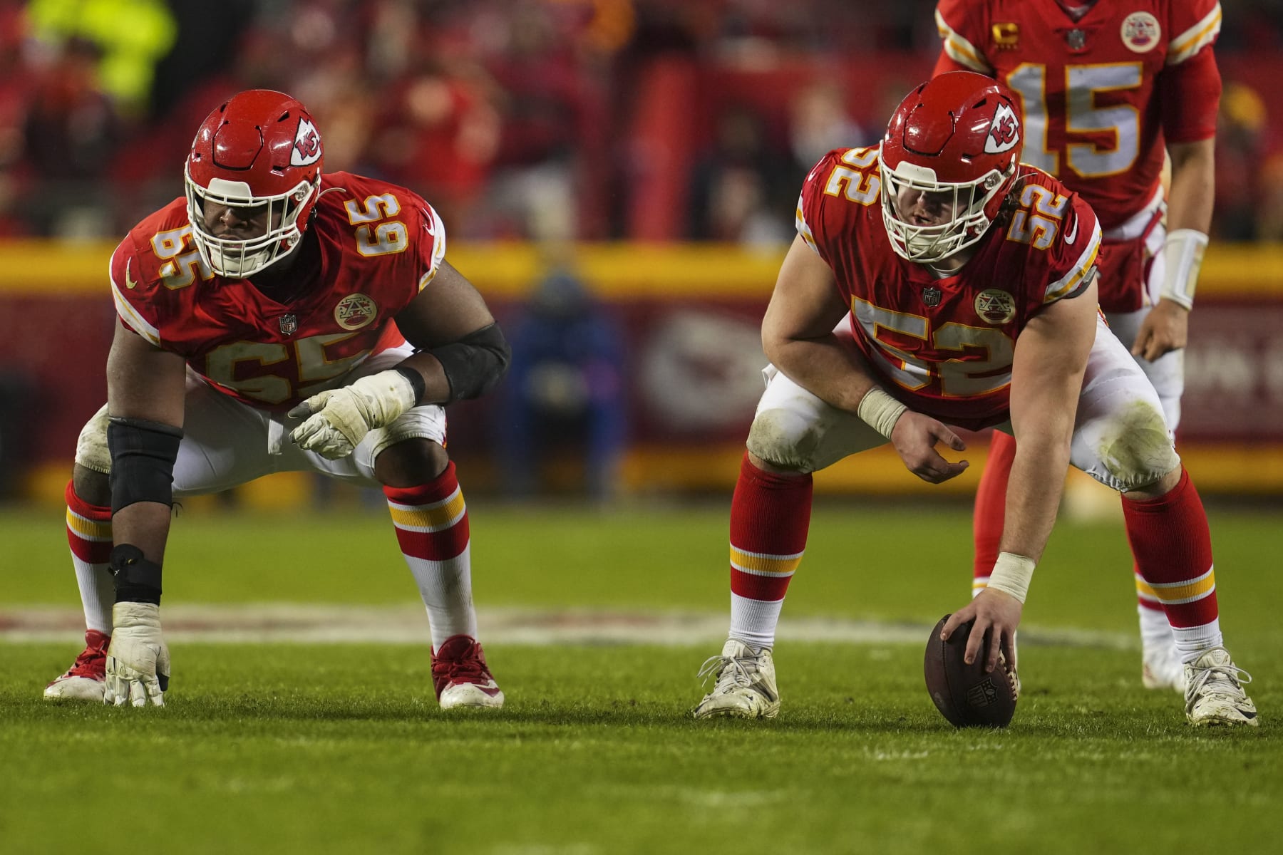 Trey Smith (65) and Creed Humphrey (52)